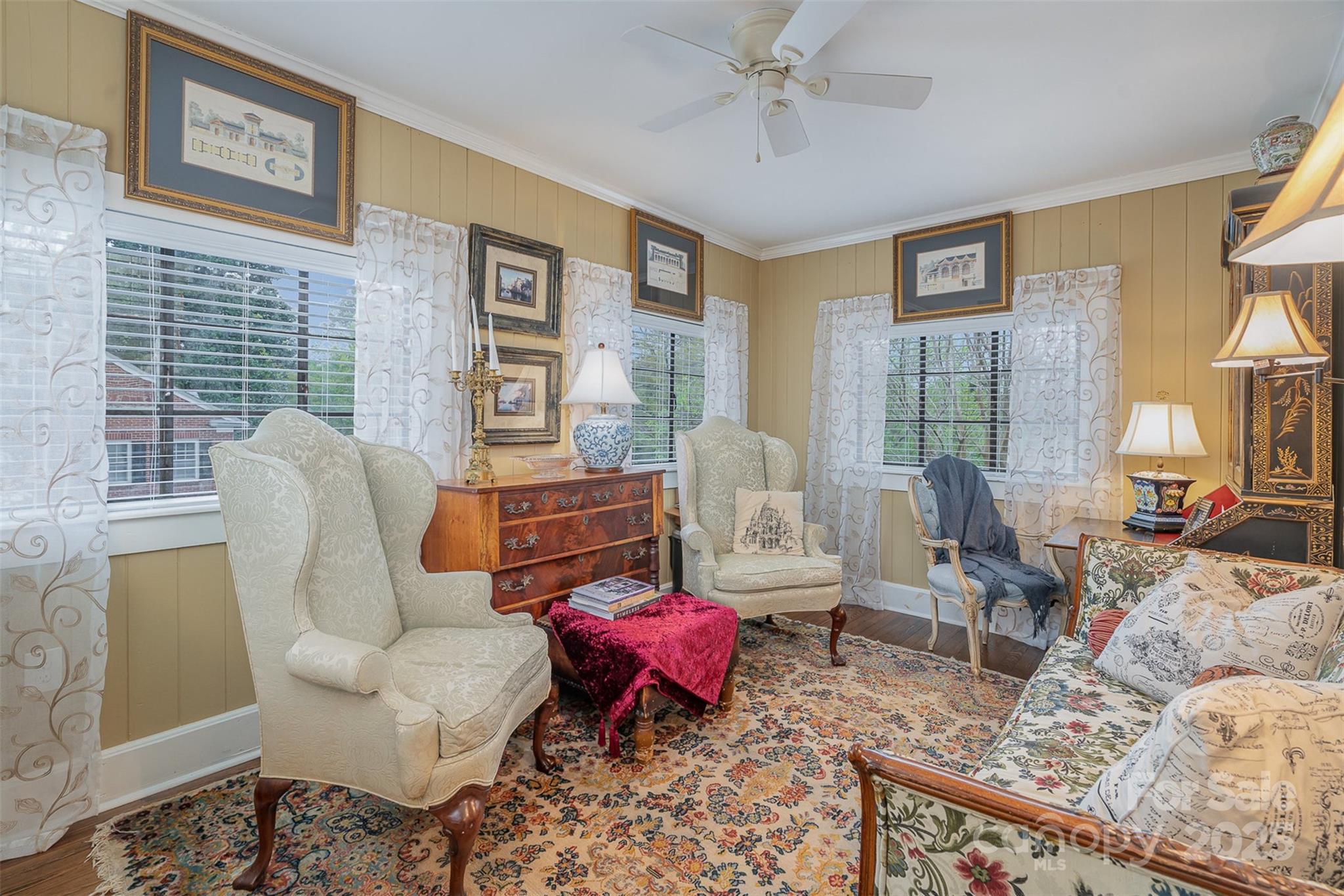 1313 South York Road Gastonia, NC 28052 - Photo 28 of 45 a living room with furniture and wooden floor