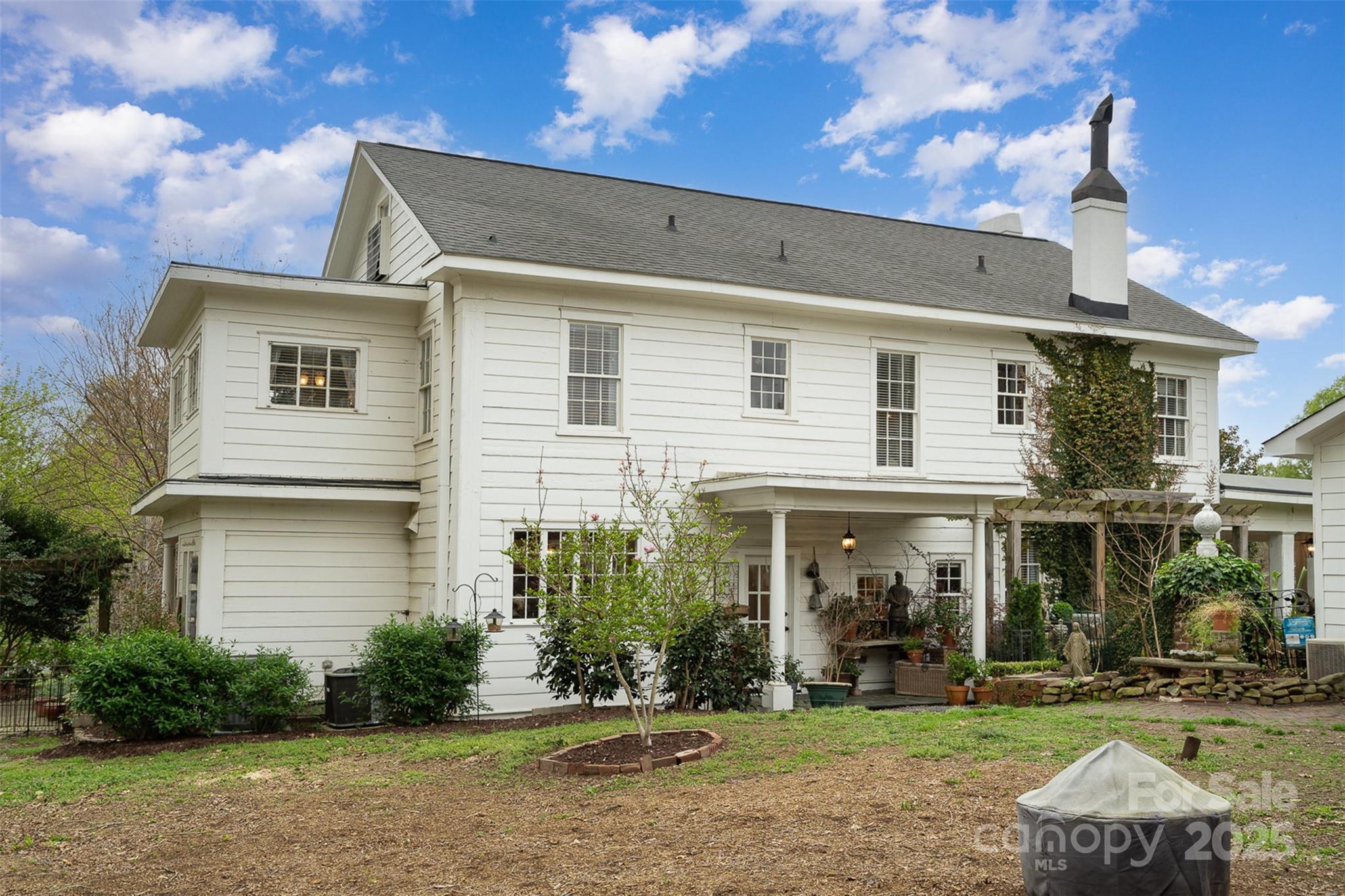 1313 South York Road Gastonia, NC 28052 - Photo 39 of 45 front view of a house with a patio
