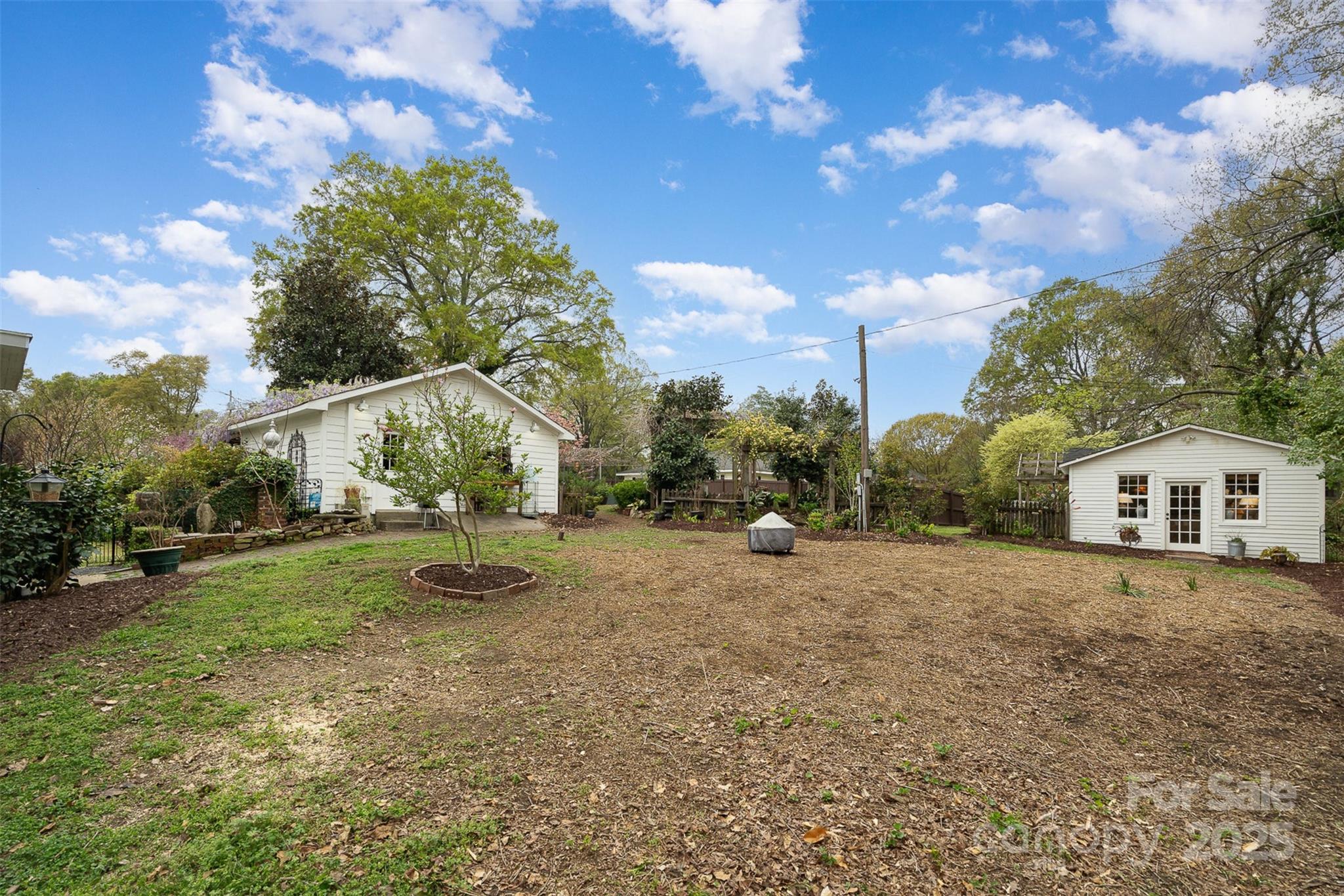 1313 South York Road Gastonia, NC 28052 - Photo 40 of 45 a view of a house with a yard