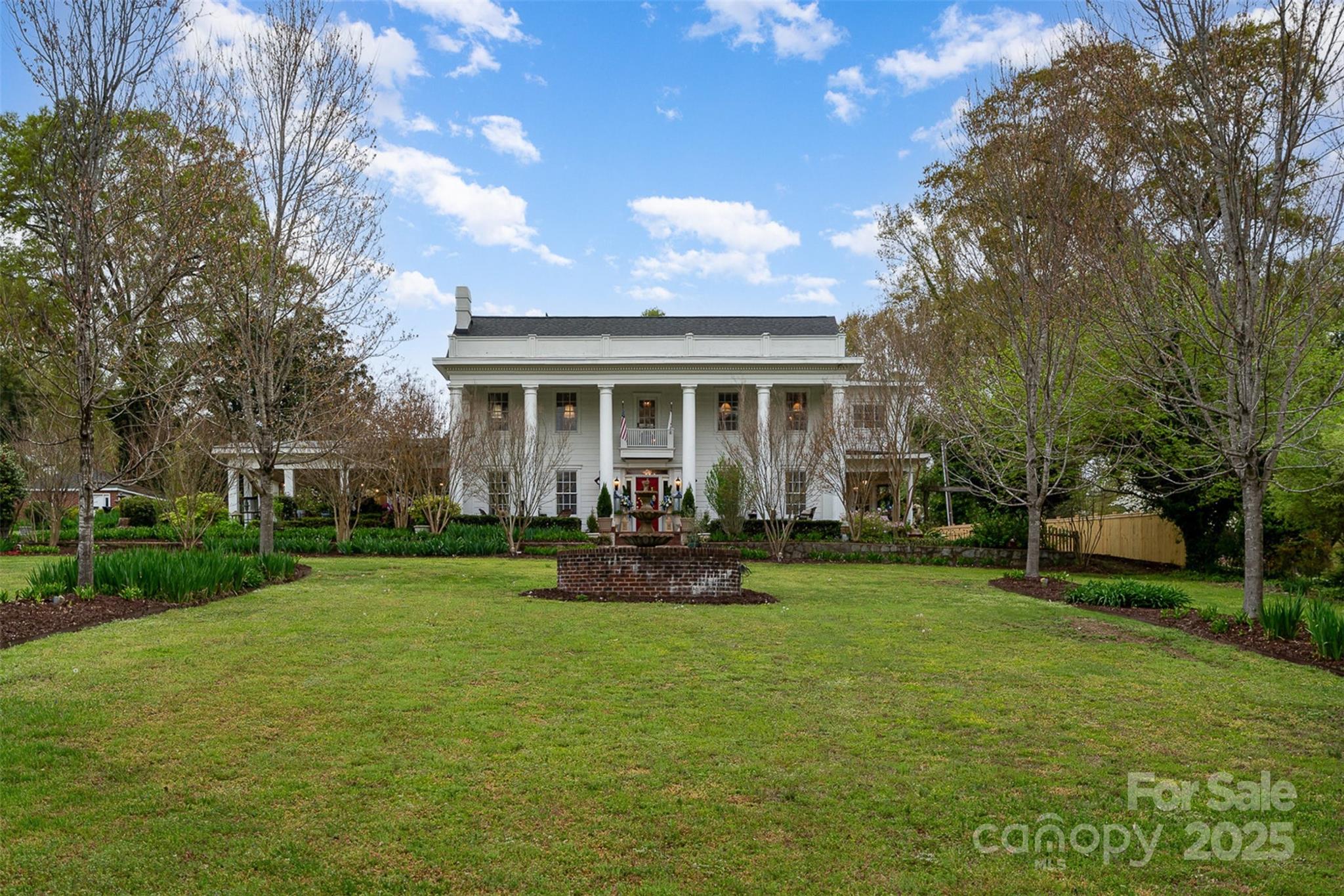 1313 South York Road Gastonia, NC 28052 - Photo 4 of 45 a view of a house with a yard and sitting area