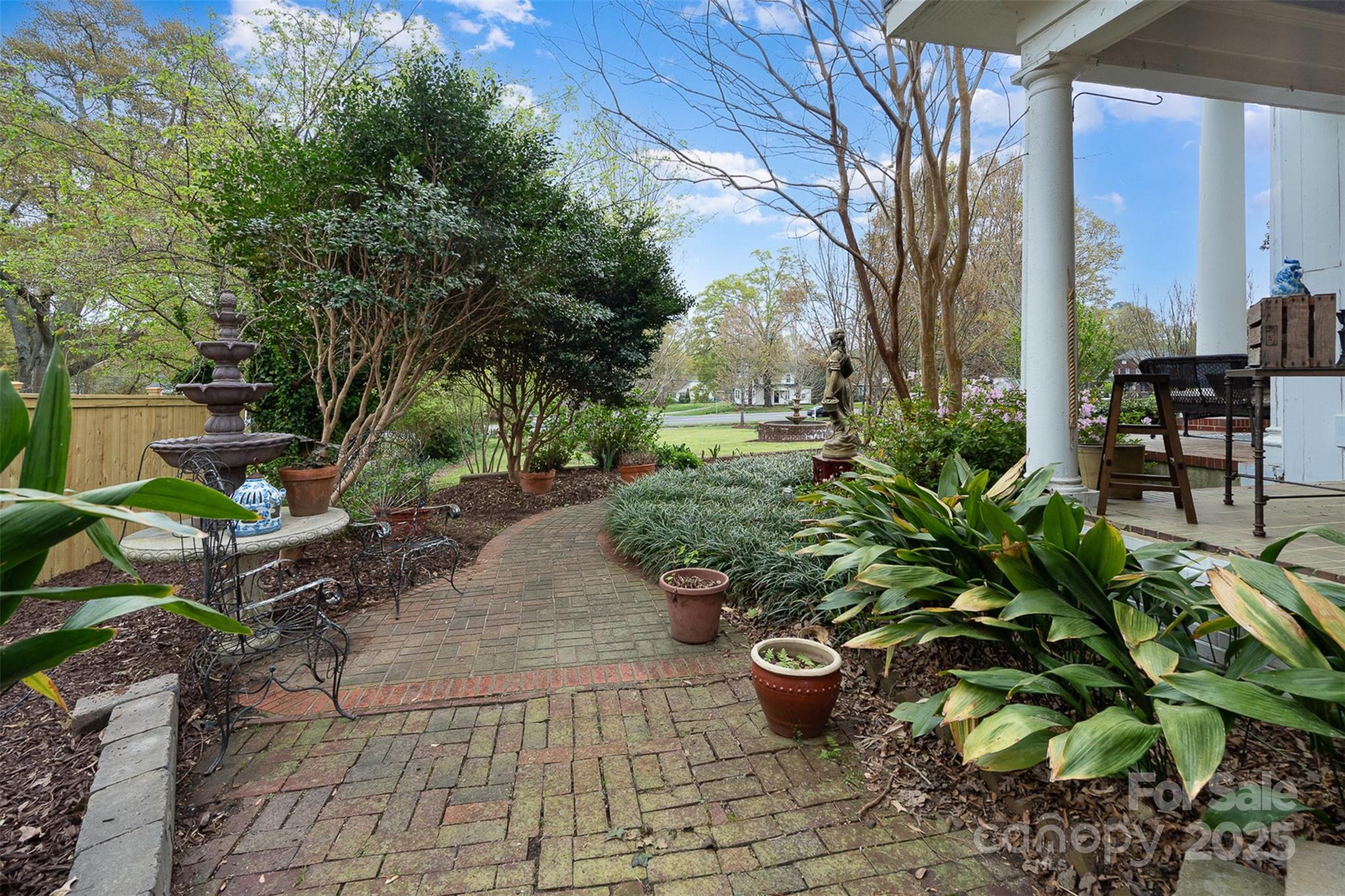1313 South York Road Gastonia, NC 28052 - Photo 41 of 45 a view of a backyard with potted plants