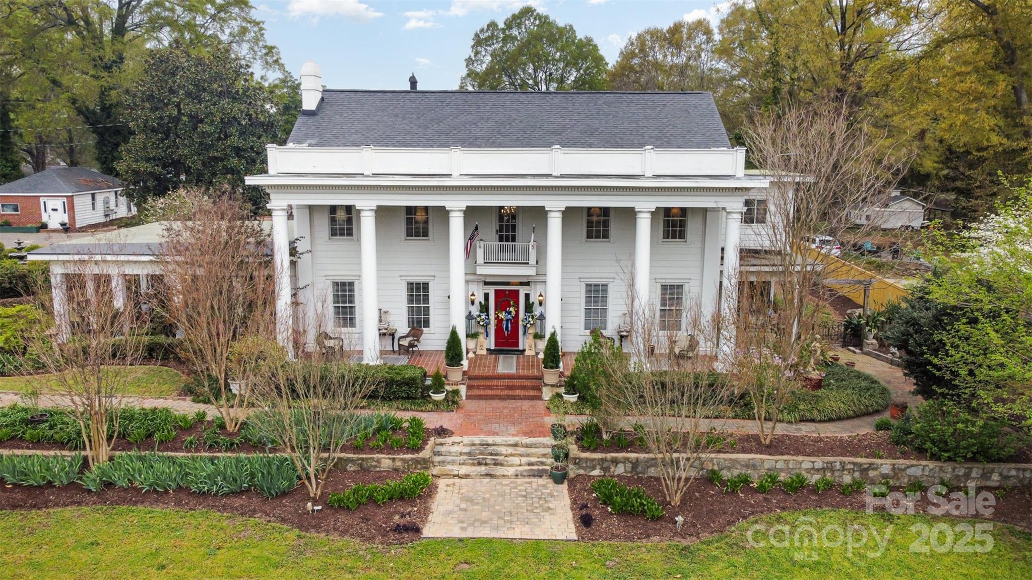 1313 South York Road Gastonia, NC 28052 - Photo 43 of 45 a front view of a house with garden