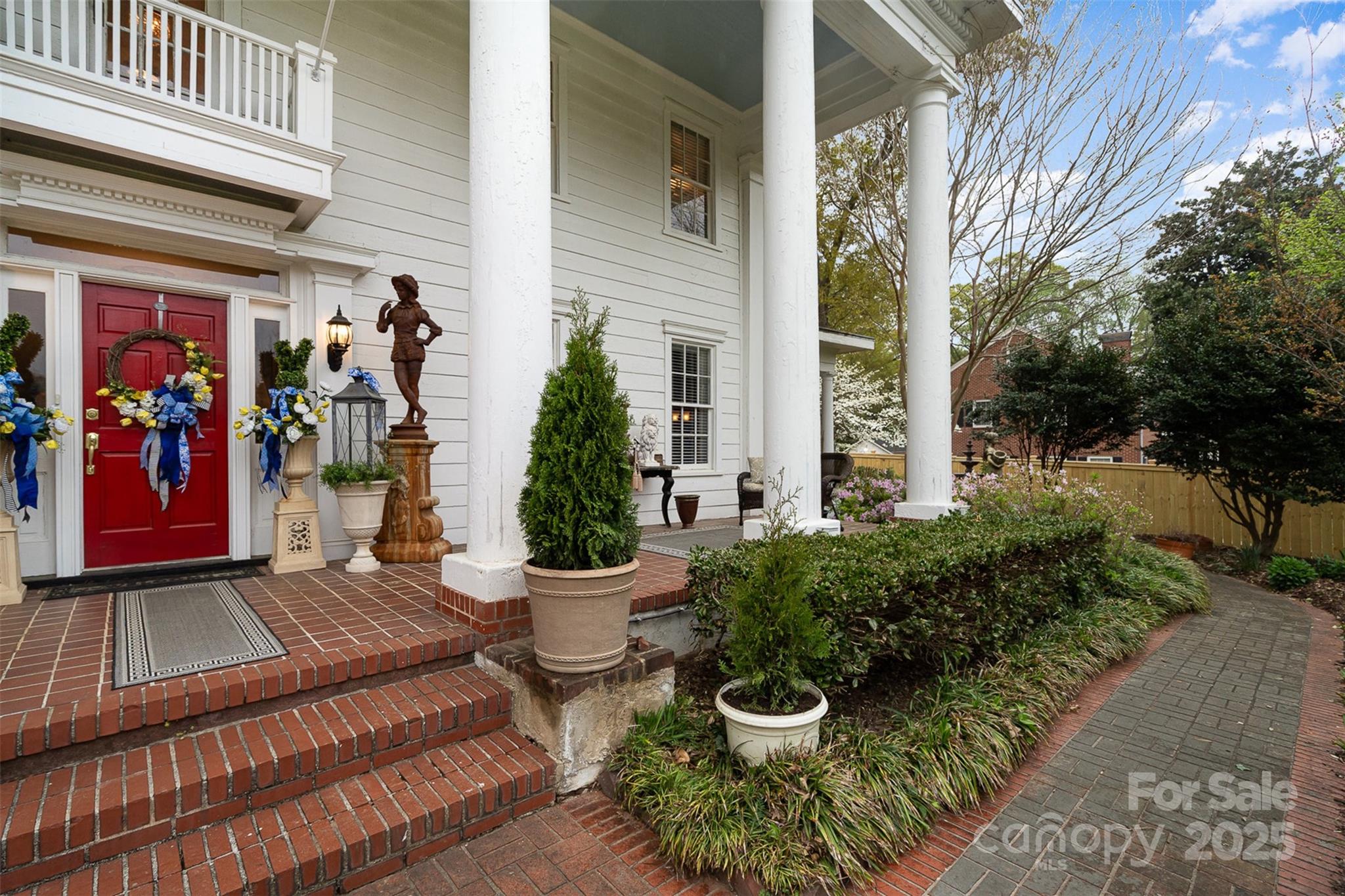 1313 South York Road Gastonia, NC 28052 - Photo 6 of 45 a view of a porch with plants and furniture