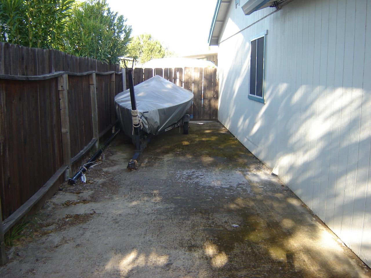1131 Beltline Road Redding, CA 96003 - Photo 3 of 3 a view of a backyard with wooden fence