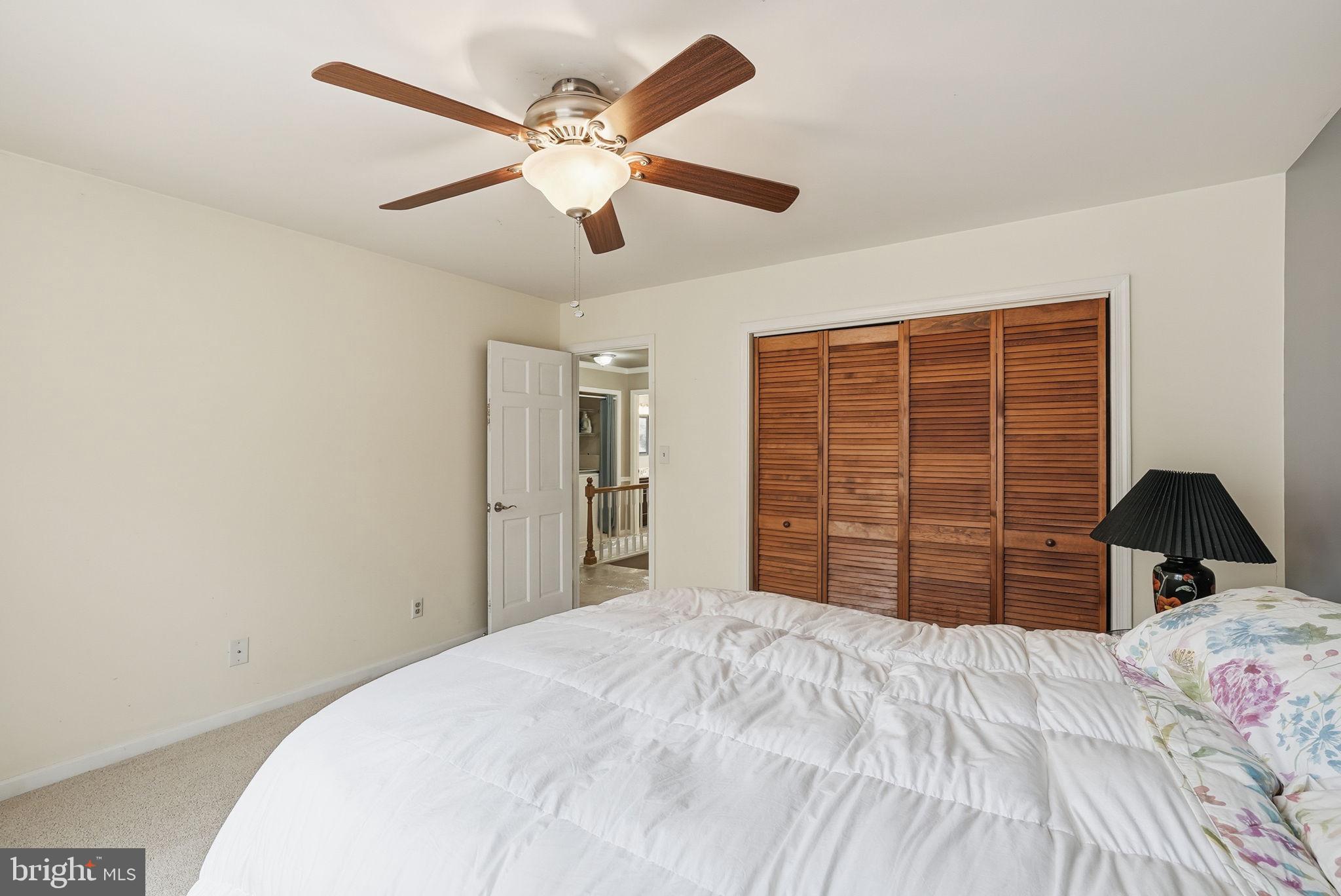 140 Hoile Lane Huntingtown, MD 20639 - Photo 28 of 44 a bedroom with a bed and a large closet