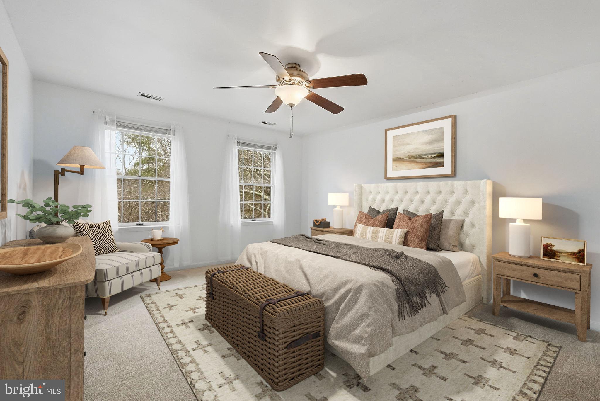 140 Hoile Lane Huntingtown, MD 20639 - Photo 29 of 44 a bedroom with a bed and a couch