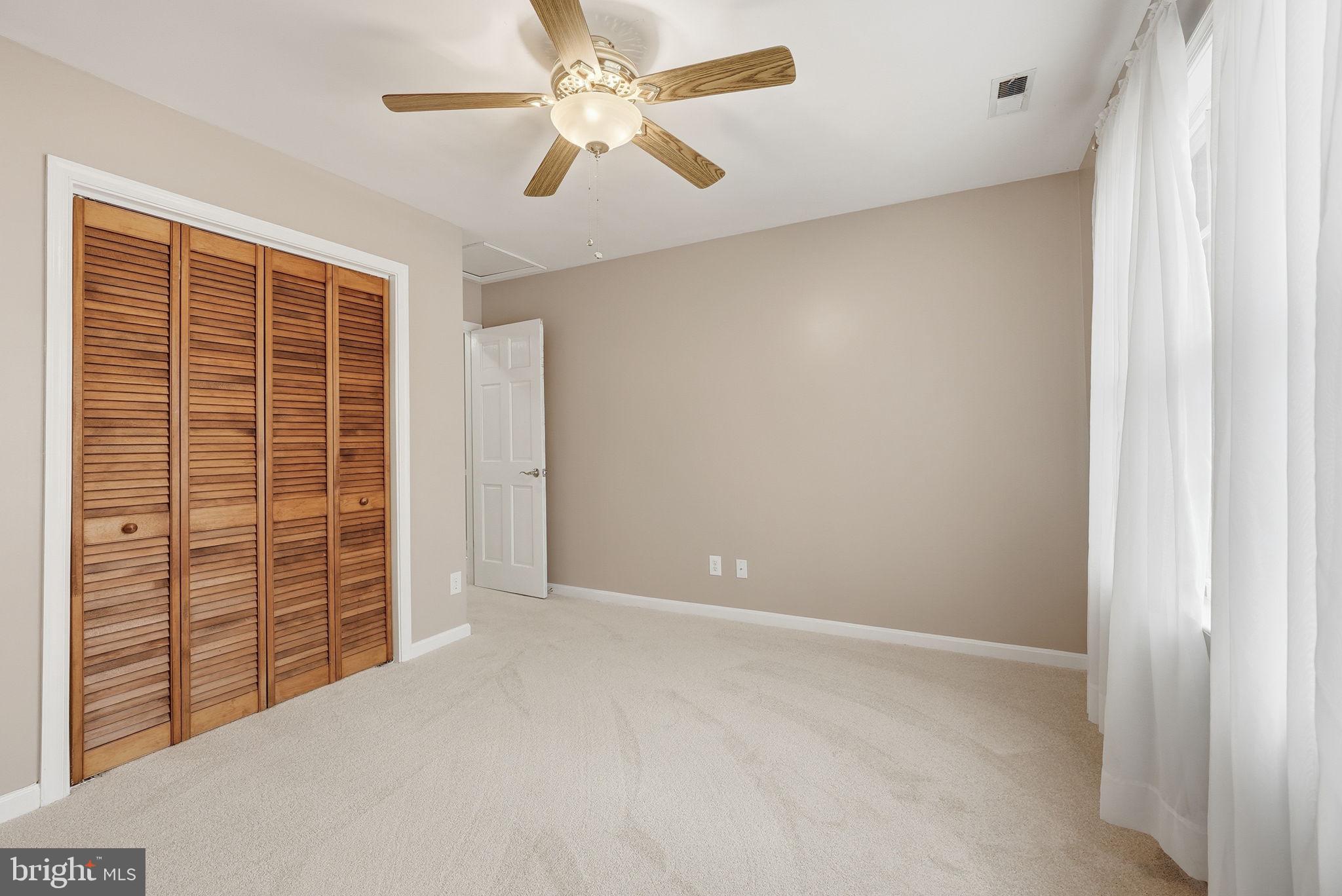 140 Hoile Lane Huntingtown, MD 20639 - Photo 35 of 44 an empty room with windows