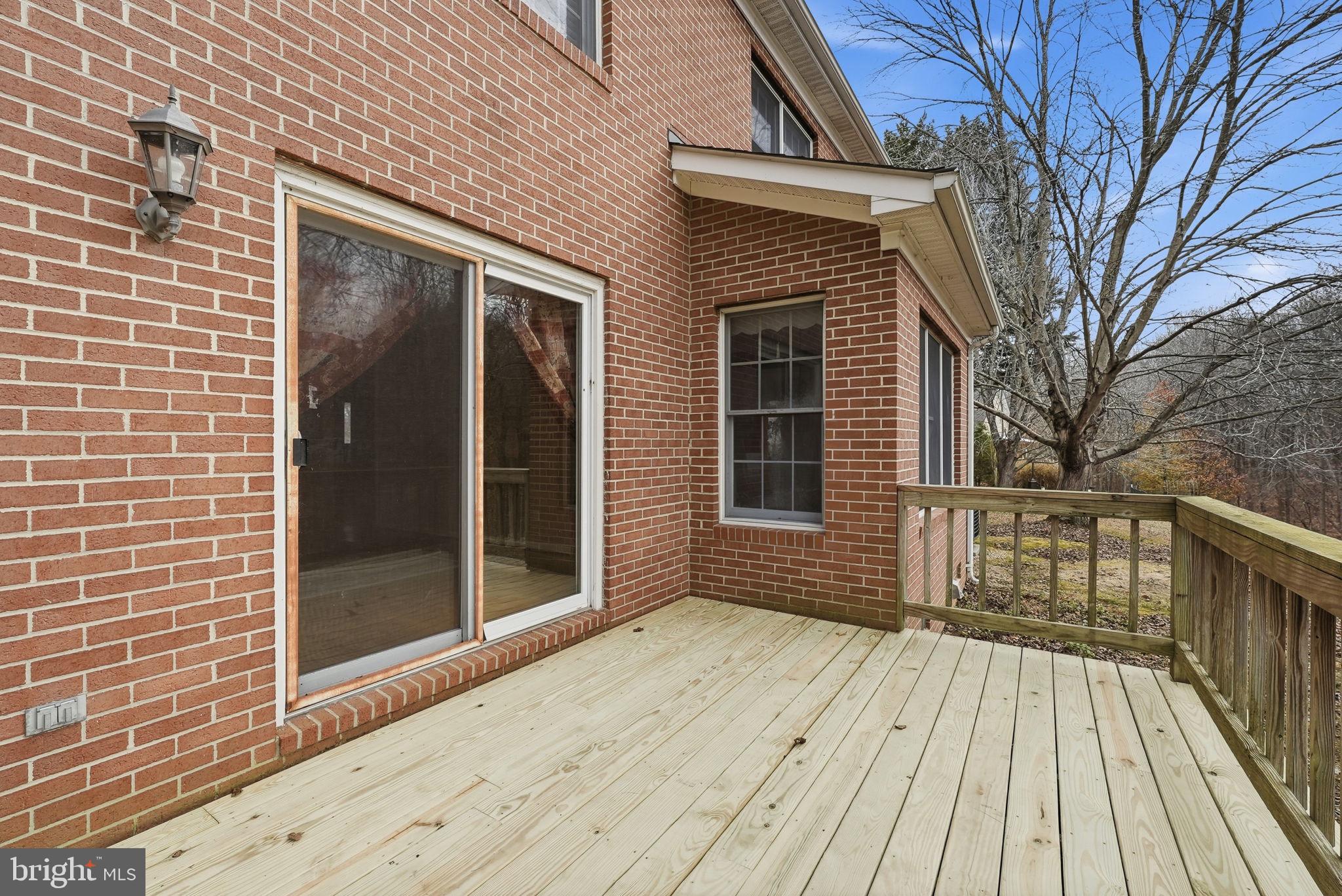 140 Hoile Lane Huntingtown, MD 20639 - Photo 36 of 44 a view of backyard with a deck