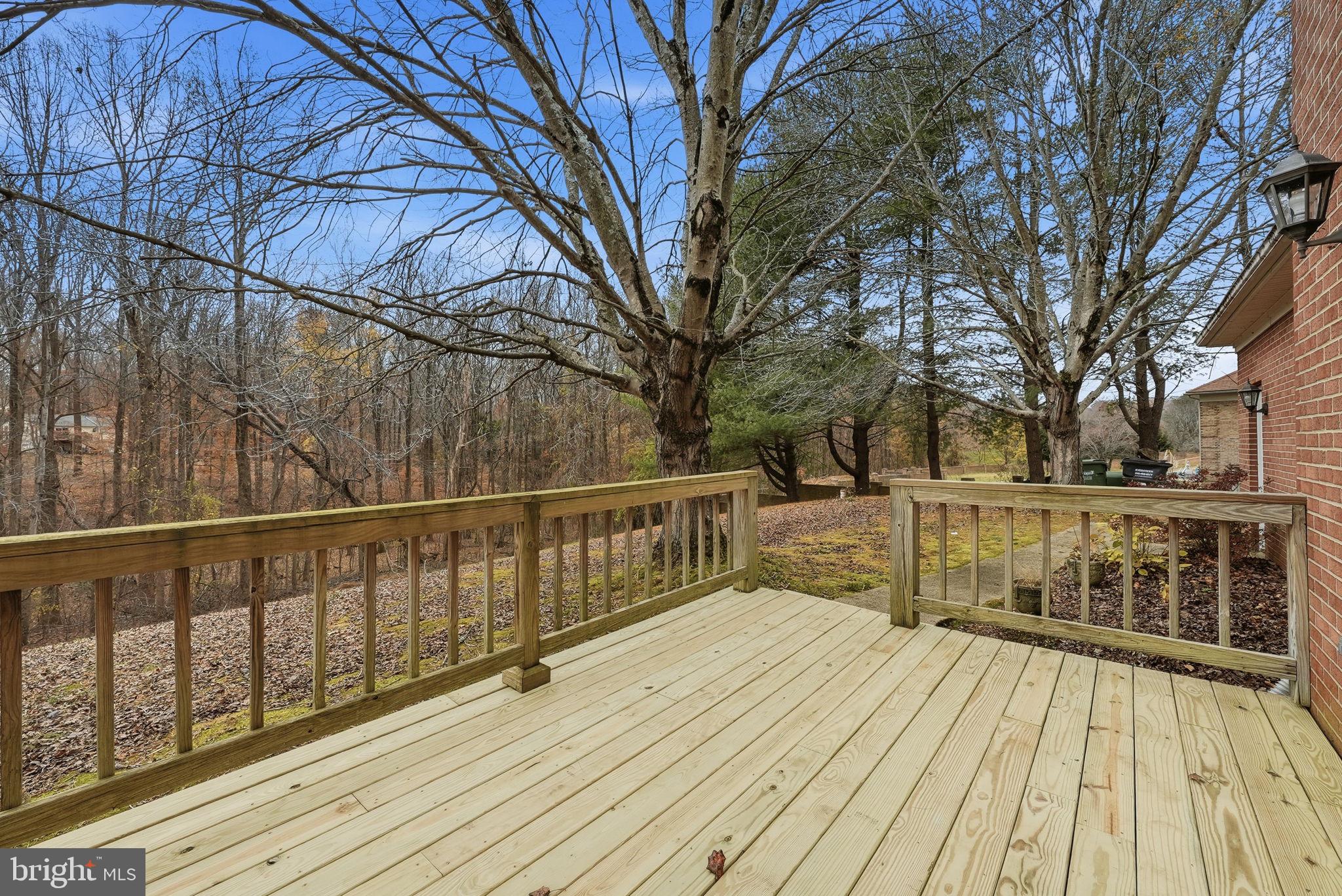 140 Hoile Lane Huntingtown, MD 20639 - Photo 37 of 44 a view of balcony with wooden floor and fence