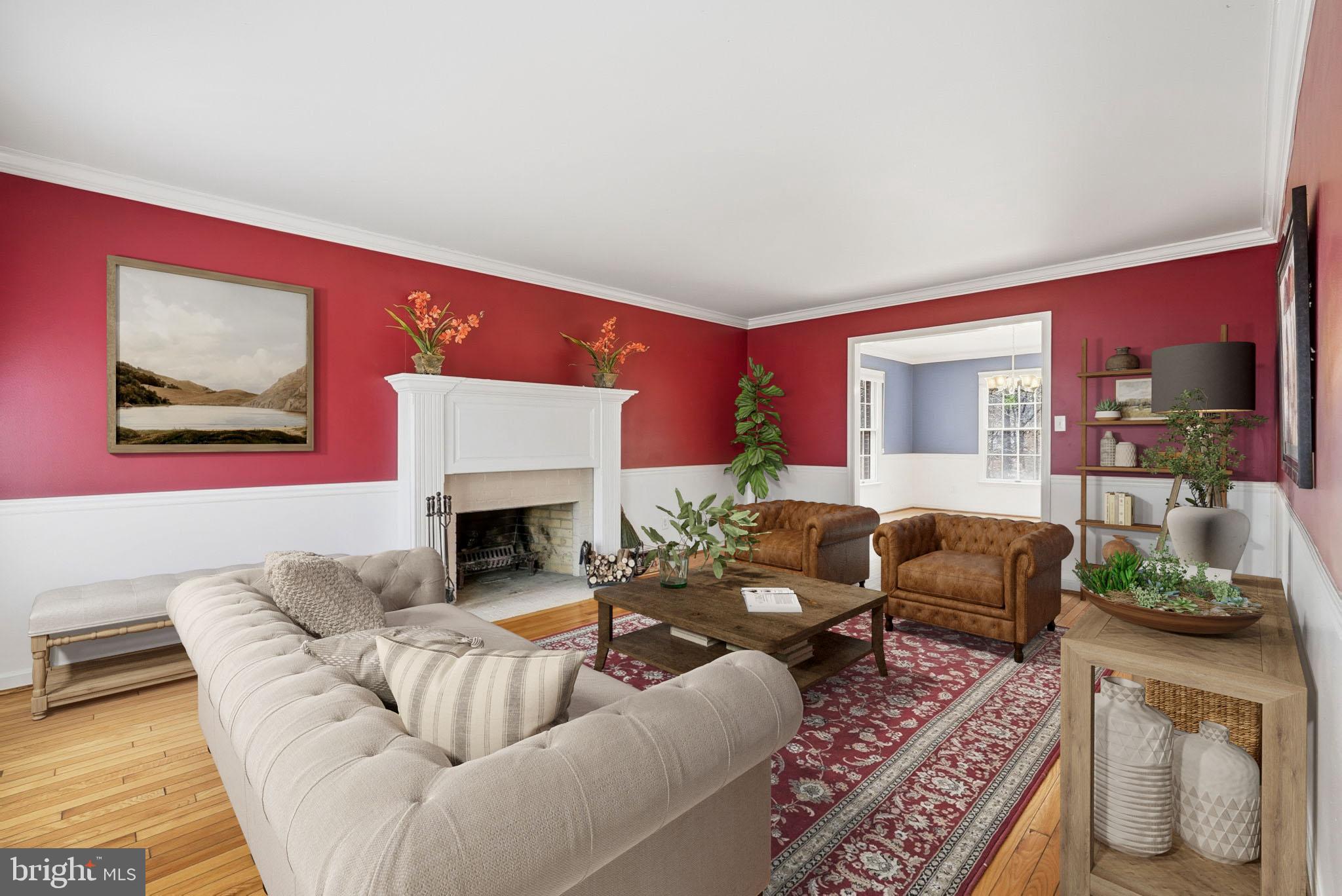 140 Hoile Lane Huntingtown, MD 20639 - Photo 4 of 44 a living room with furniture a fireplace and a floor to ceiling window