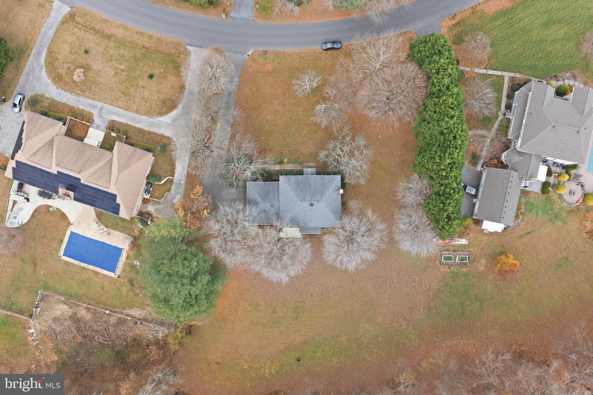 140 Hoile Lane Huntingtown, MD 20639 - Photo 44 of 44 an aerial view of a house with a swimming pool