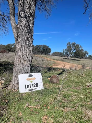 a sign board with an ocean view