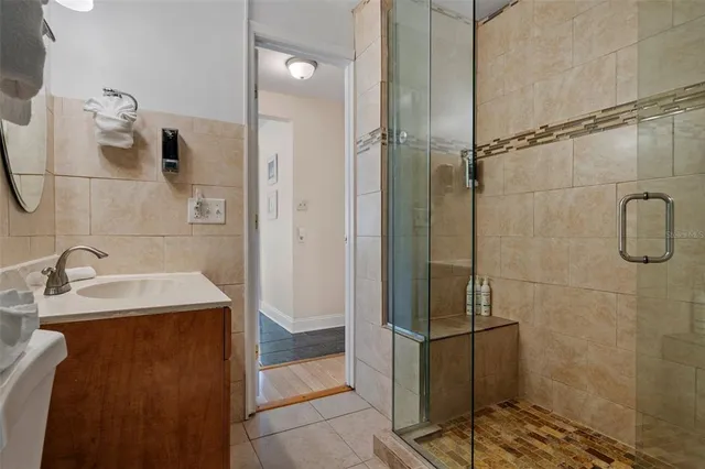 a bathroom with a sink and a shower