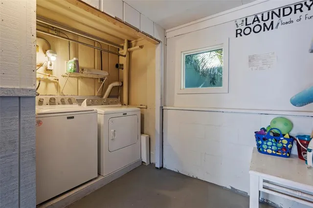 an aerial view of a house with a ocean view