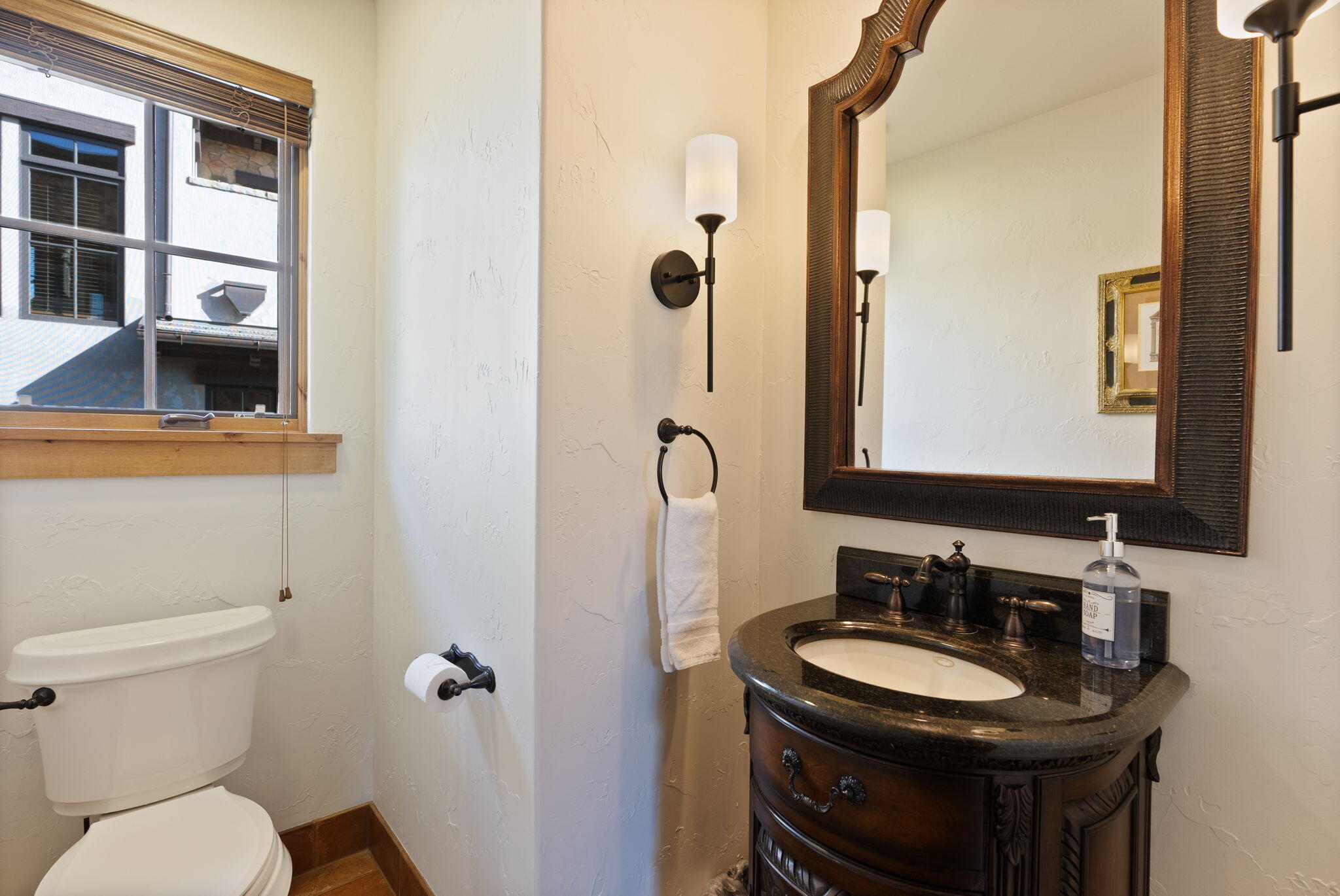 22887 Ghost Tree Lane Bend, OR 97701 - Photo 25 of 97 Freshly painted and updated lighting main level powder bath