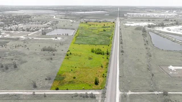 a view of a swimming pool with a balcony