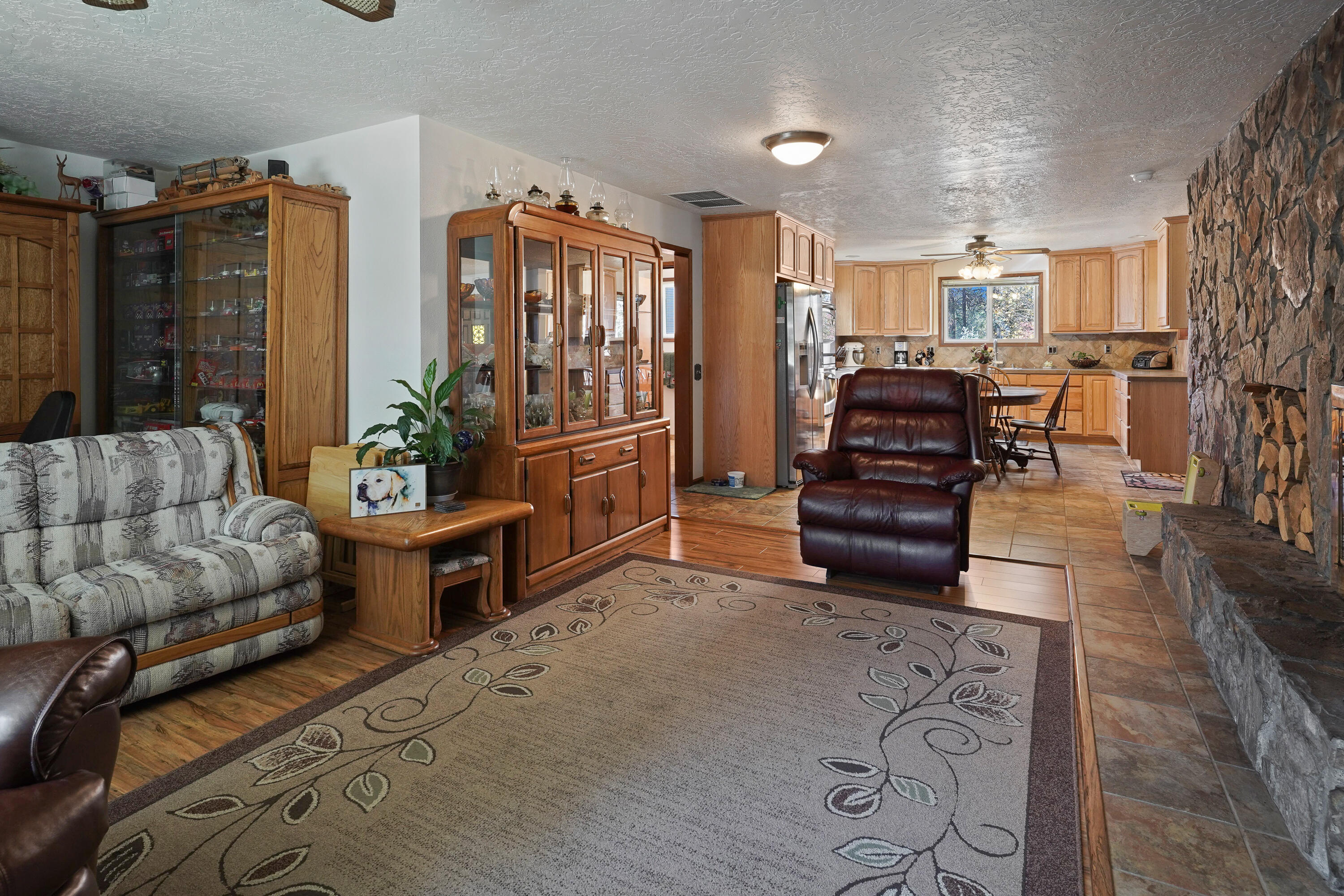 52390 Huntington Road La Pine, OR 97739 - Photo 18 of 37 Double sided fireplace.