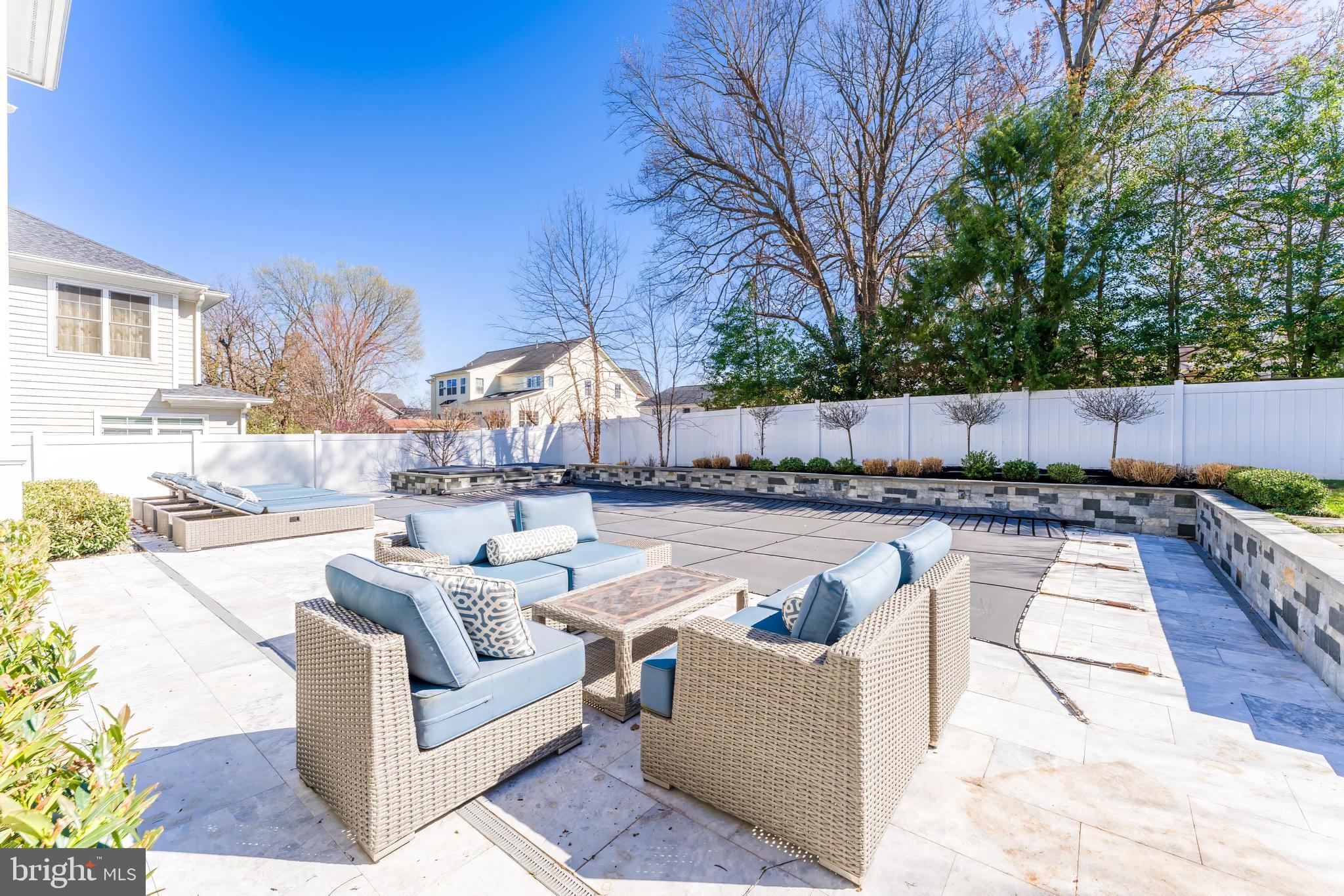 6805 Lumsden Street McLean, VA 22101 - Photo 120 of 123 a view of a swimming pool with couches and a fire pit