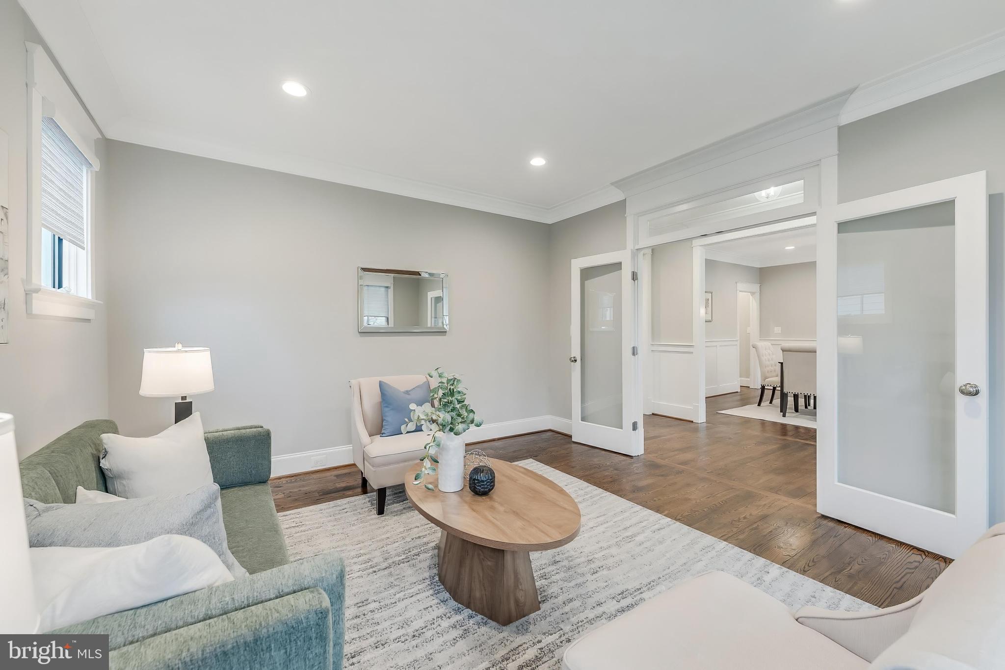 6805 Lumsden Street McLean, VA 22101 - Photo 14 of 123 a living room with furniture and a wooden floor