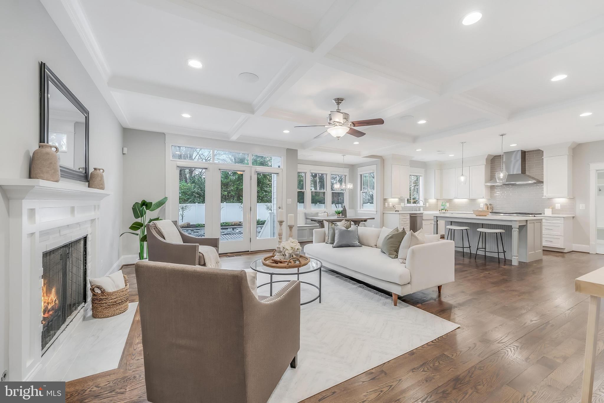 6805 Lumsden Street McLean, VA 22101 - Photo 22 of 123 a living room with fireplace furniture and a view of kitchen