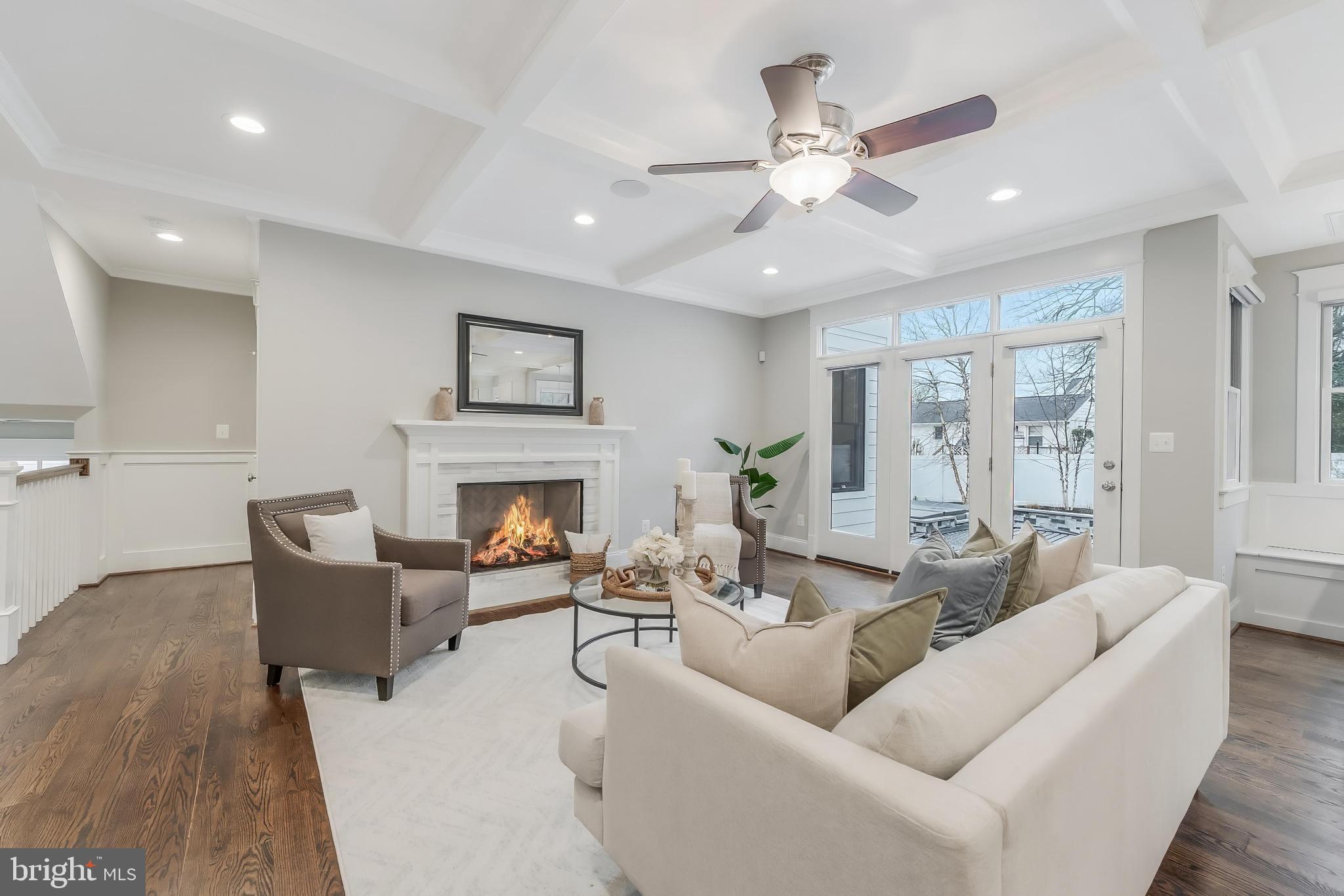 6805 Lumsden Street McLean, VA 22101 - Photo 25 of 123 a living room with furniture and a fireplace