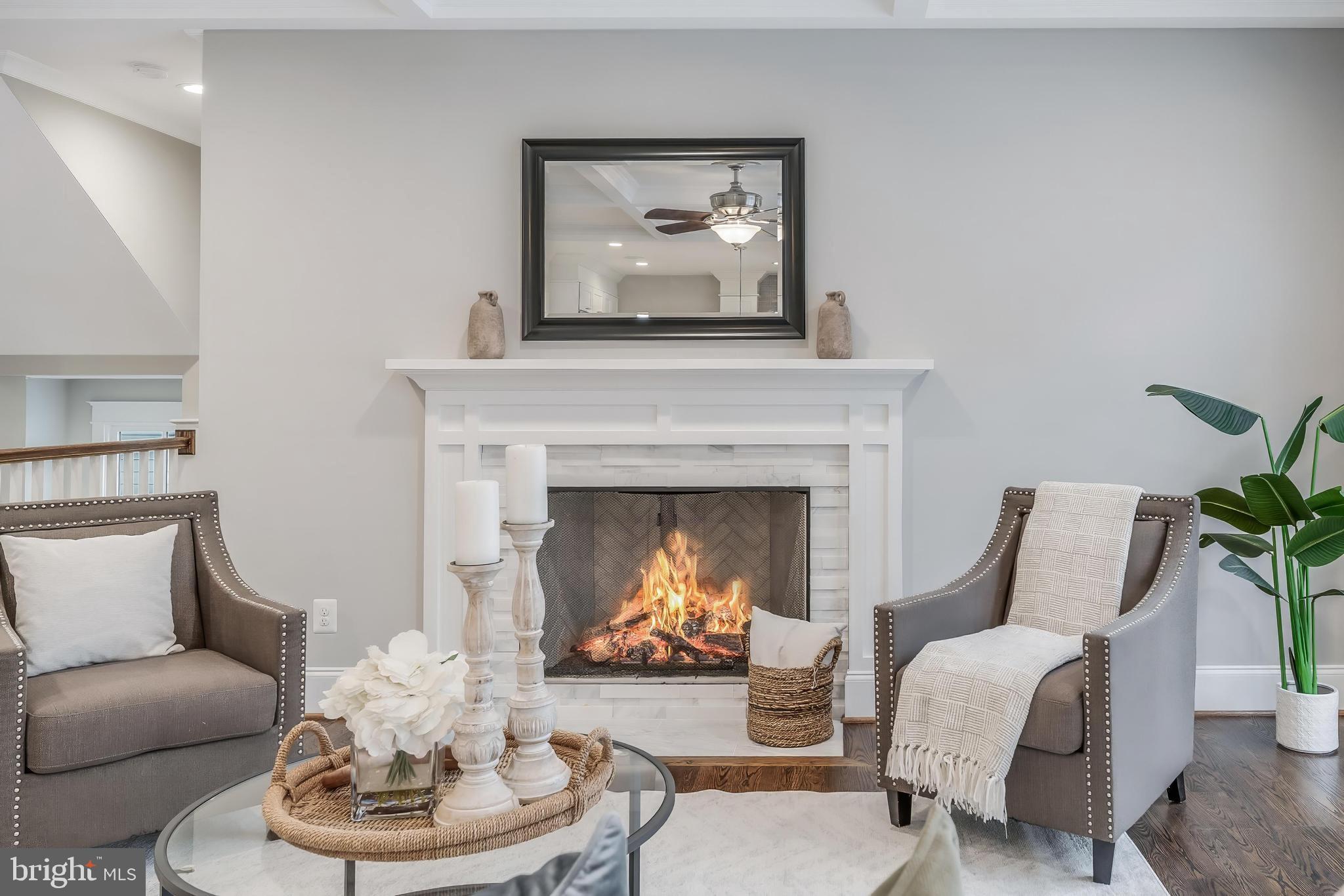 6805 Lumsden Street McLean, VA 22101 - Photo 29 of 123 a living room with furniture and a fireplace