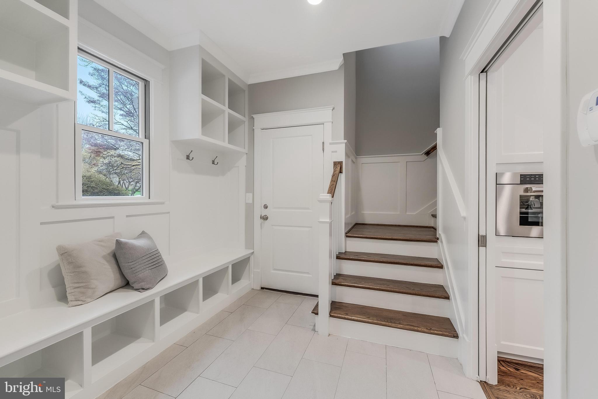 6805 Lumsden Street McLean, VA 22101 - Photo 48 of 123 a view of a livingroom with wooden floor and windows