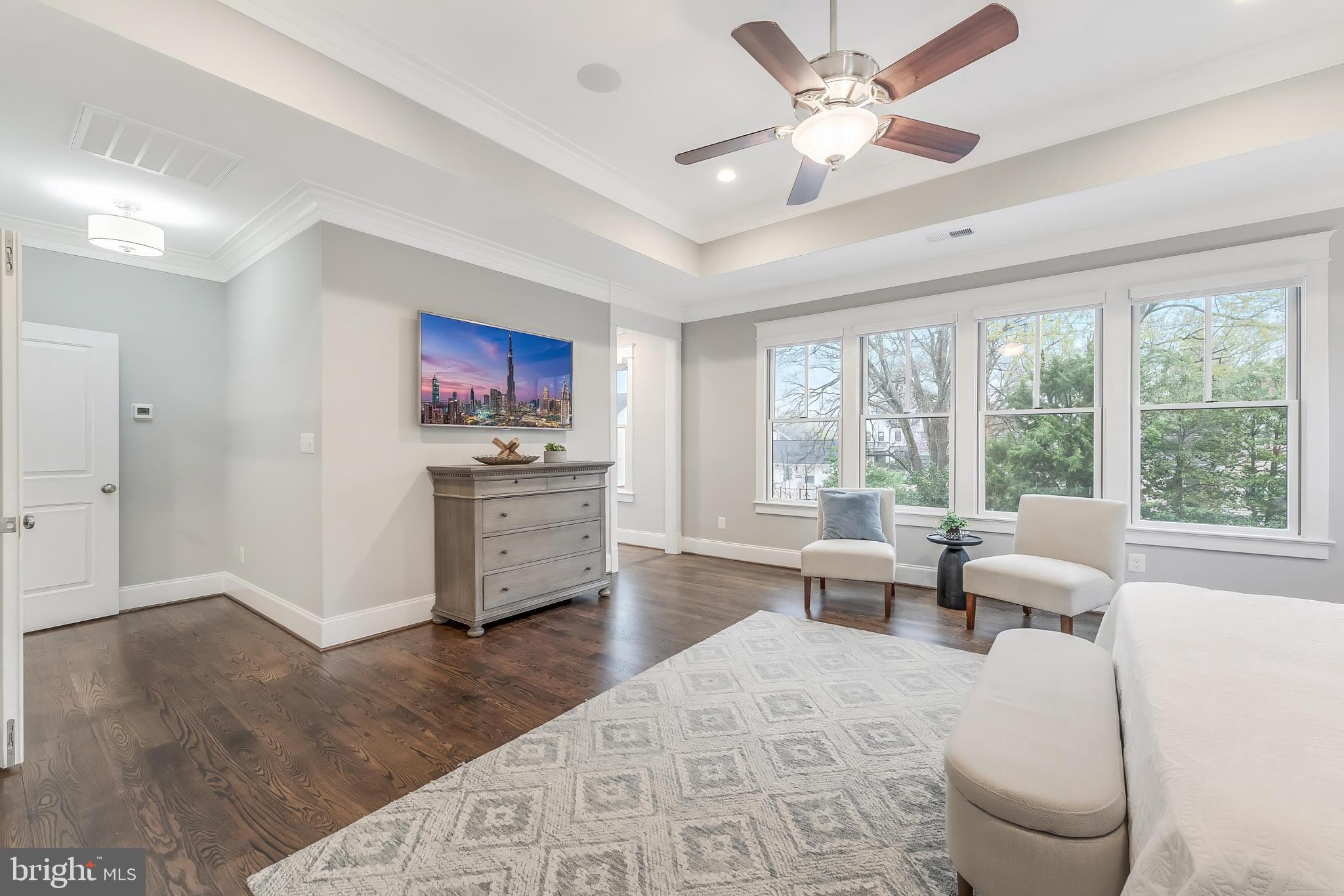 6805 Lumsden Street McLean, VA 22101 - Photo 63 of 123 a living room with furniture a large window with wooden floor