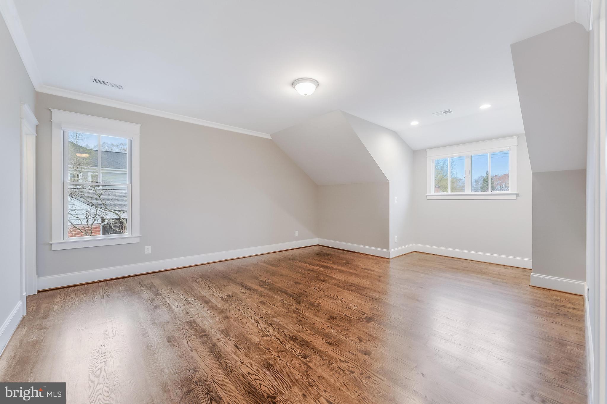6805 Lumsden Street McLean, VA 22101 - Photo 87 of 123 an empty room with wooden floor and windows
