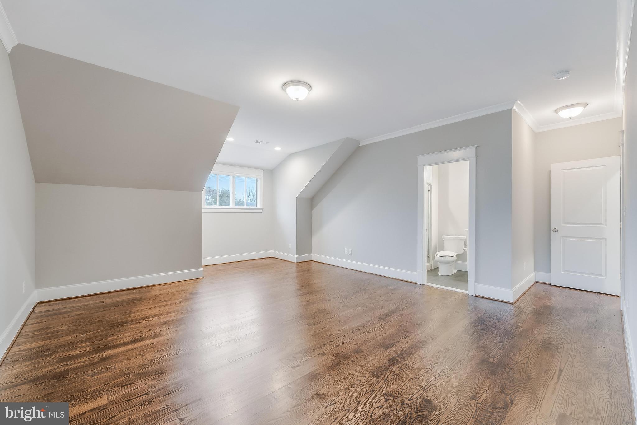 6805 Lumsden Street McLean, VA 22101 - Photo 88 of 123 a view of an empty room with window and wooden floor