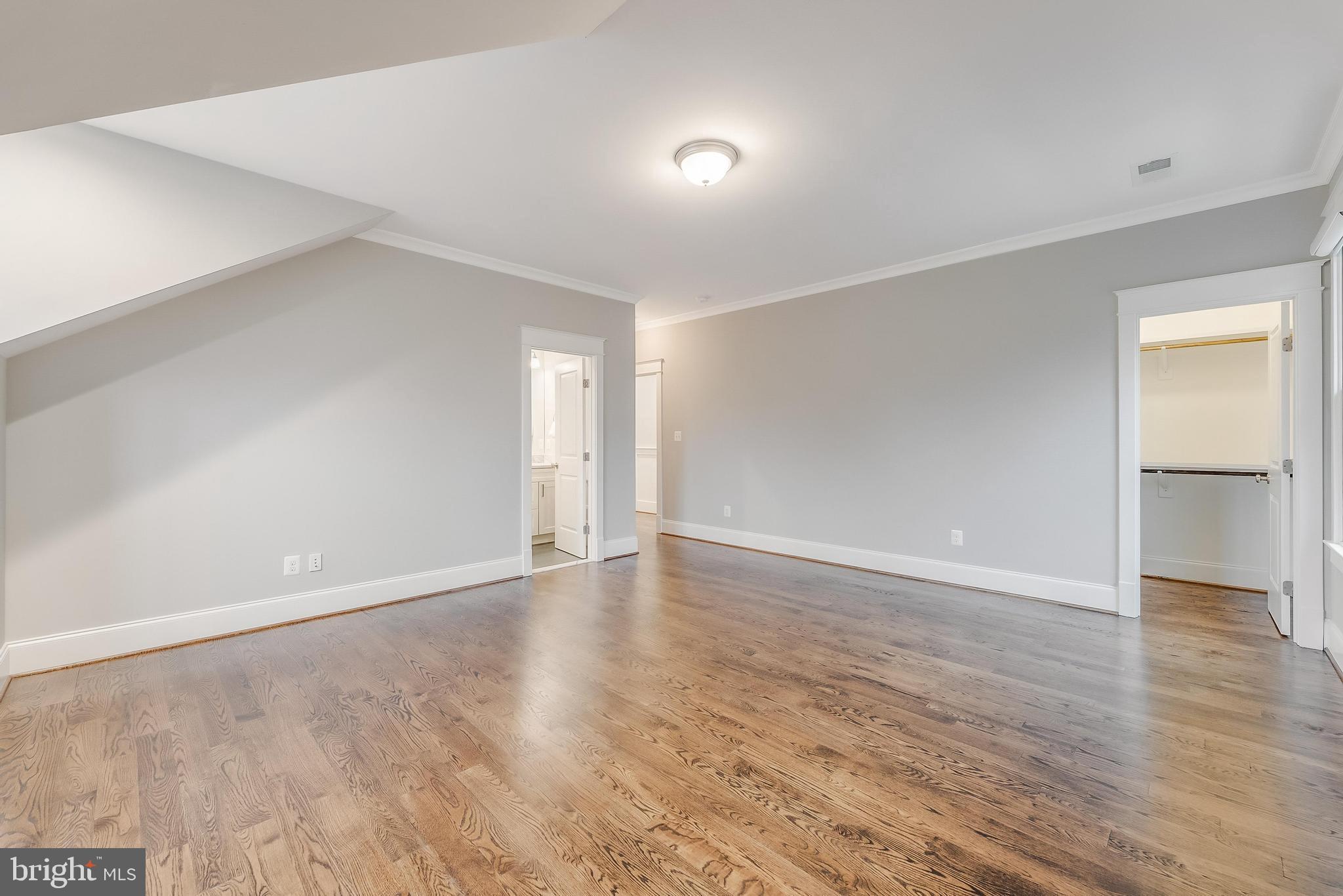 6805 Lumsden Street McLean, VA 22101 - Photo 89 of 123 a view of an empty room with wooden floor and a window