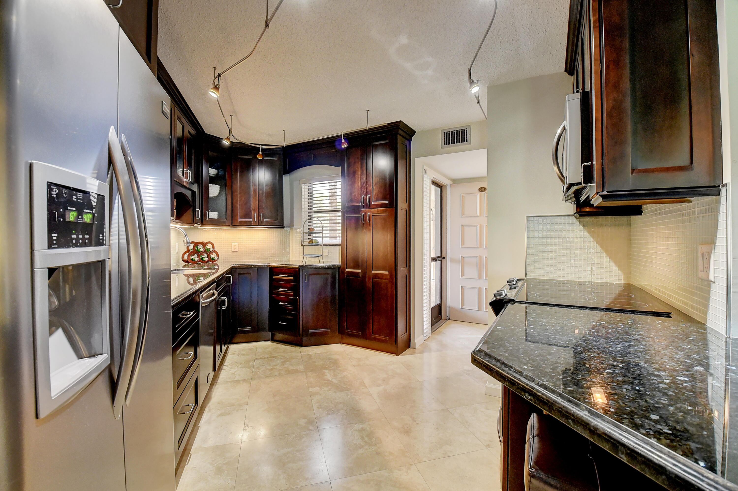 5701 Camino Del Sol, Unit 206 Boca Raton, FL 33433 - Photo 12 of 38 KITCHEN