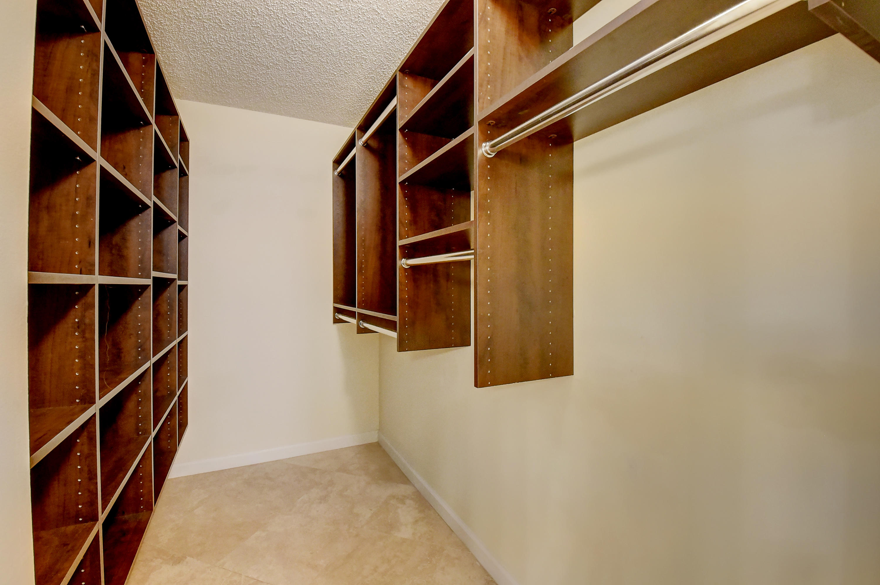 5701 Camino Del Sol, Unit 206 Boca Raton, FL 33433 - Photo 20 of 38 MASTER BEDROOM CLOSET