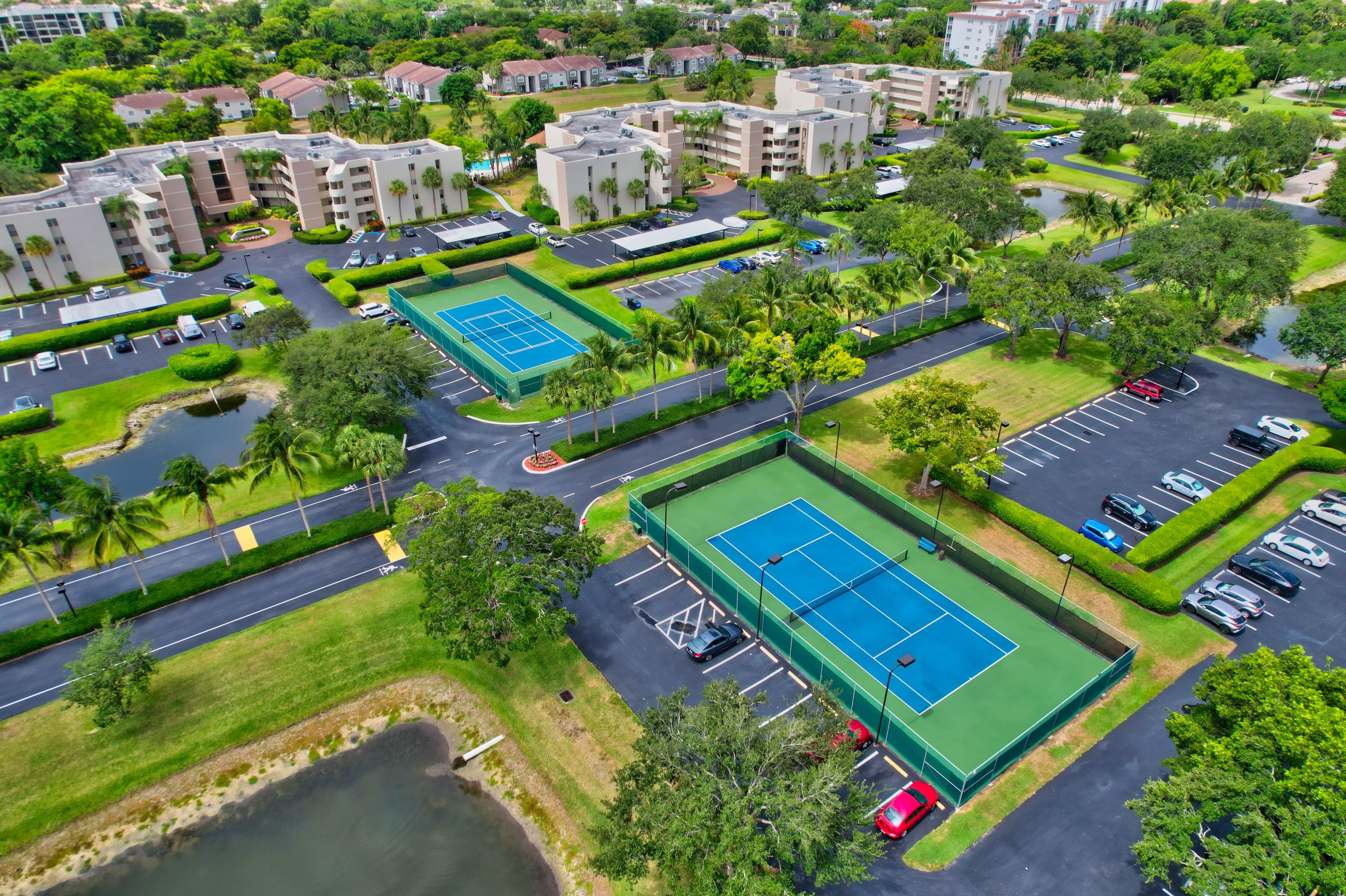 5701 Camino Del Sol, Unit 206 Boca Raton, FL 33433 - Photo 35 of 38 TENNIS COURTS