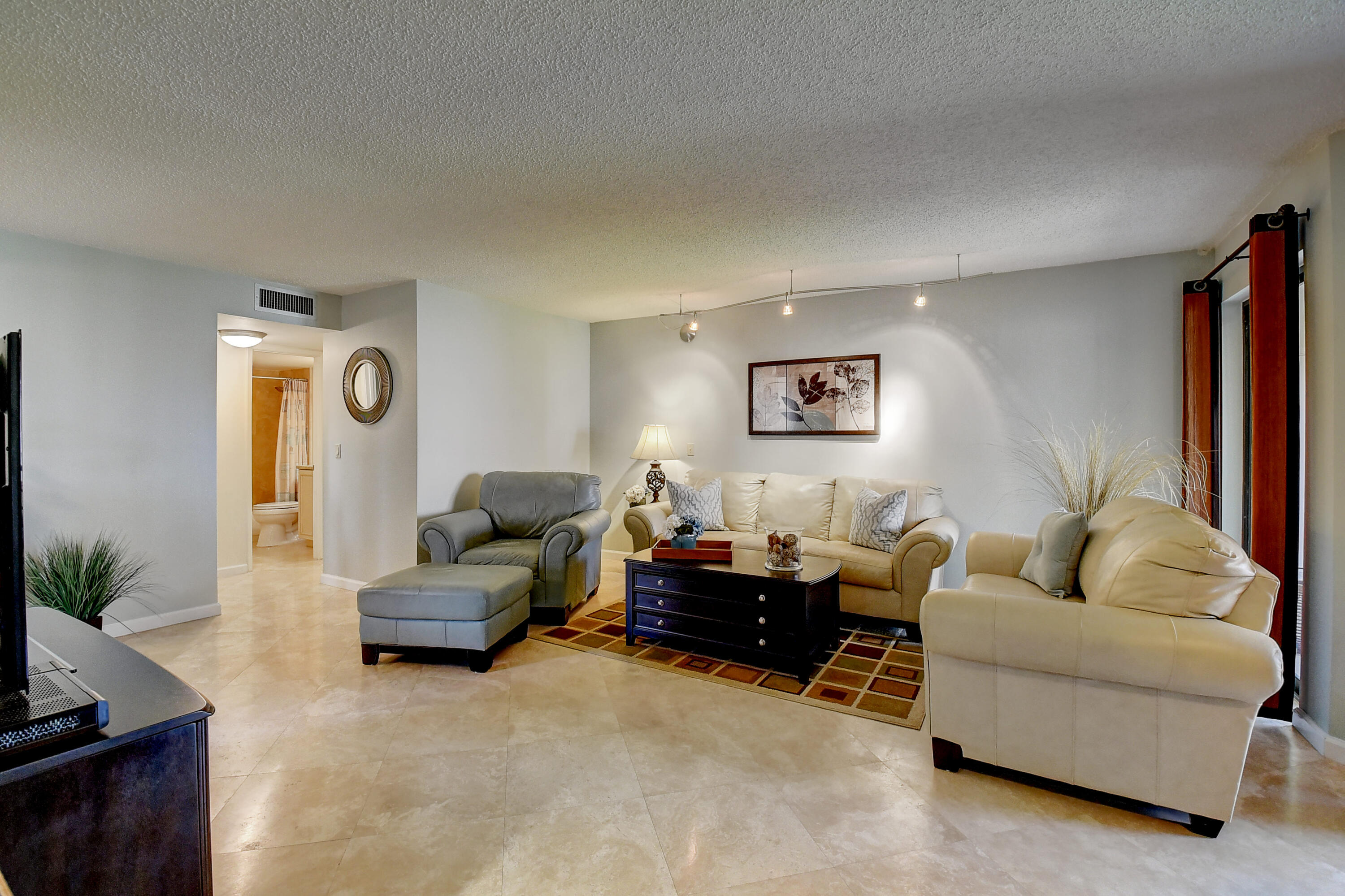 5701 Camino Del Sol, Unit 206 Boca Raton, FL 33433 - Photo 8 of 38 LIVING ROOM
