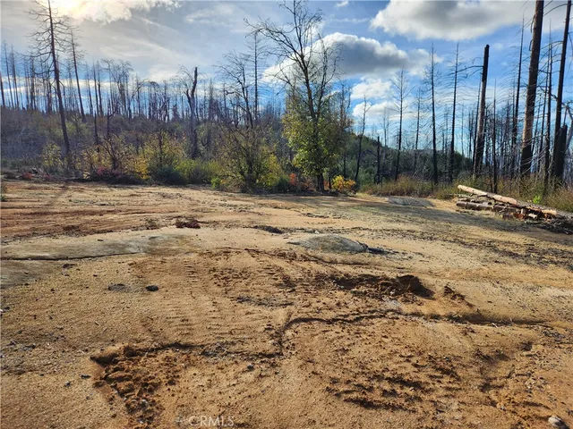 a view of a backyard of a house