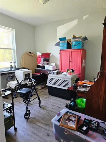 a bed room with a bed and a window