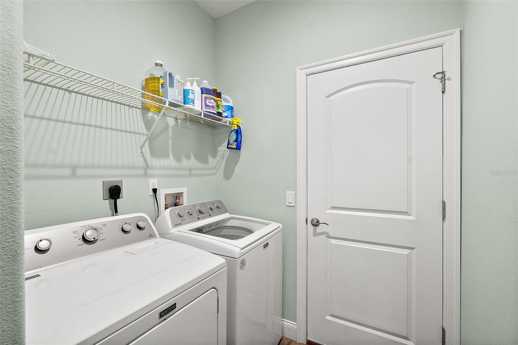 6 Wavecrest Place Palm Coast, FL 32164 - Photo 14 of 22 a utility room with dryer and washer