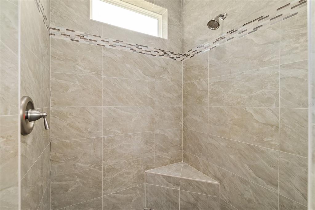 6 Wavecrest Place Palm Coast, FL 32164 - Photo 18 of 22 a bathroom with a shower