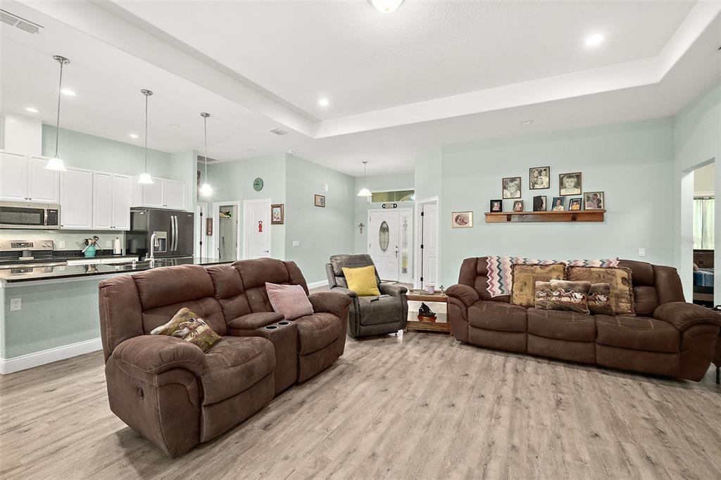 6 Wavecrest Place Palm Coast, FL 32164 - Photo 6 of 22 a living room with furniture and a kitchen view