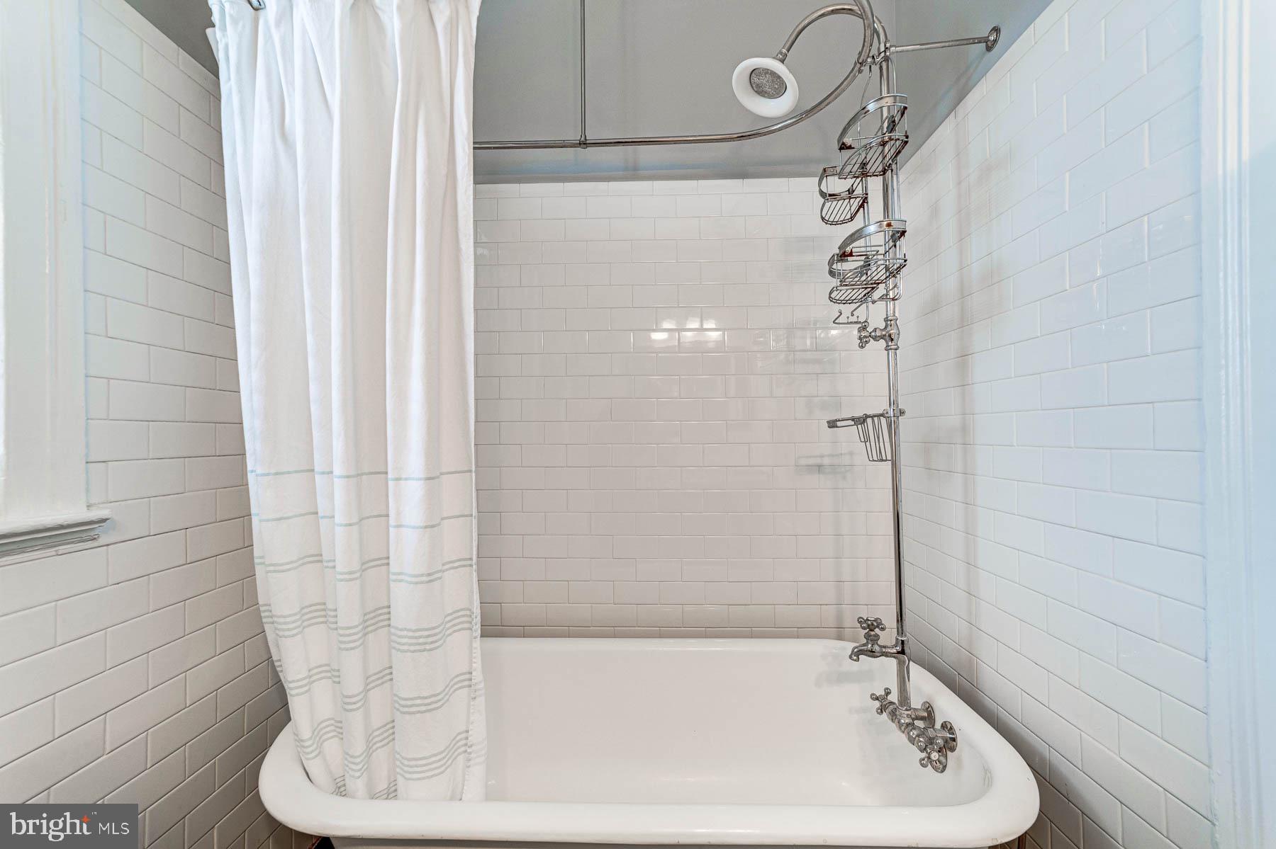 117 R Street Northwest Washington, DC 20001 - Photo 27 of 45 Claw foot tub and classic subway tile