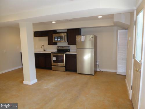117 R Street Northwest Washington, DC 20001 - Photo 36 of 45 Basement Apartment Living Room and Kitchen