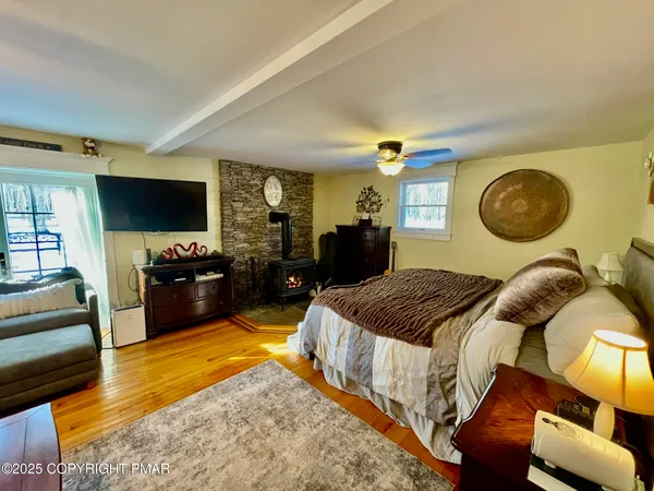 a room with furniture and wooden floor