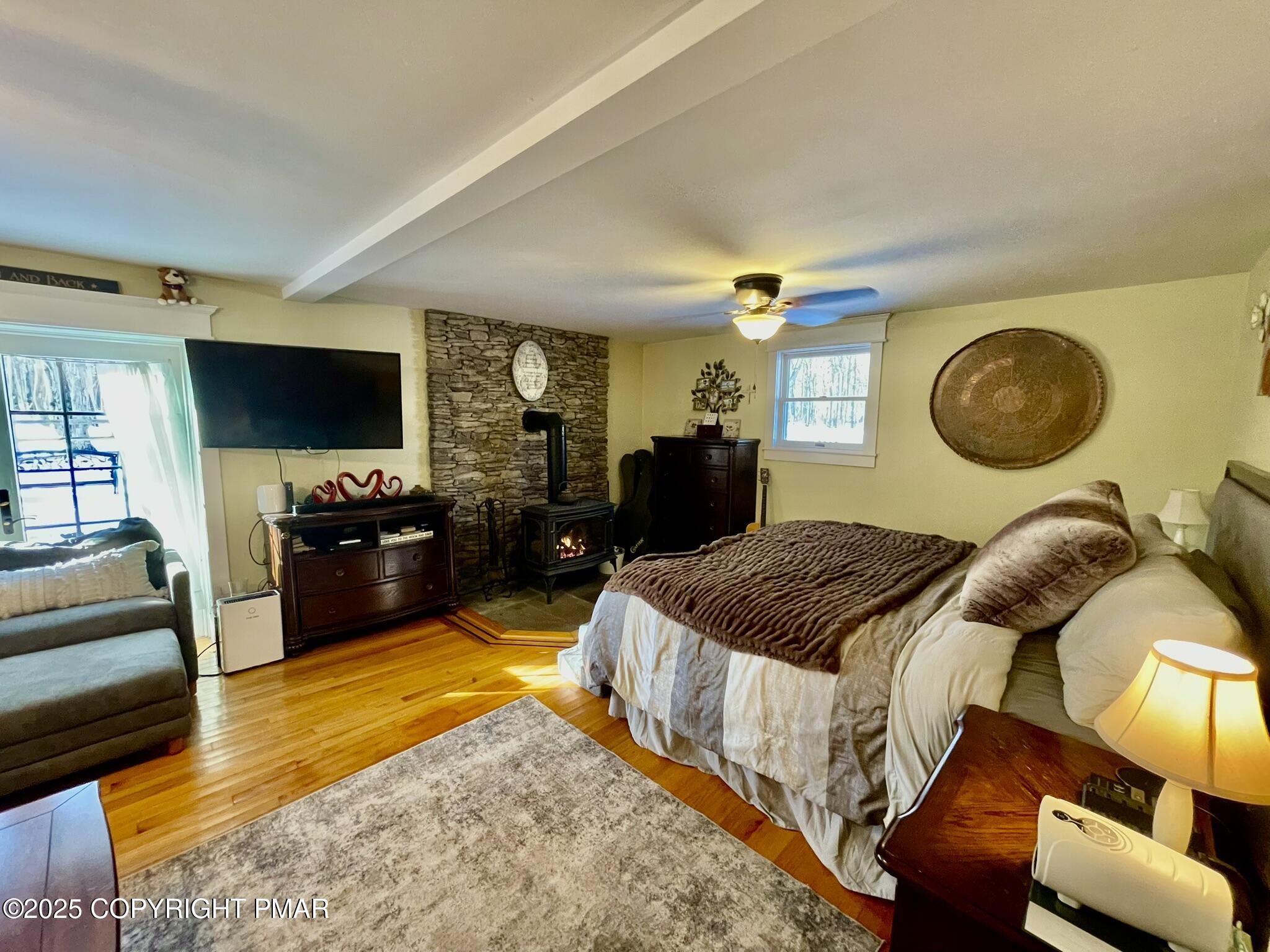 73 Panther Run Road Jim Thorpe, PA 18229 - Photo 12 of 55 a bedroom with a bed and couch