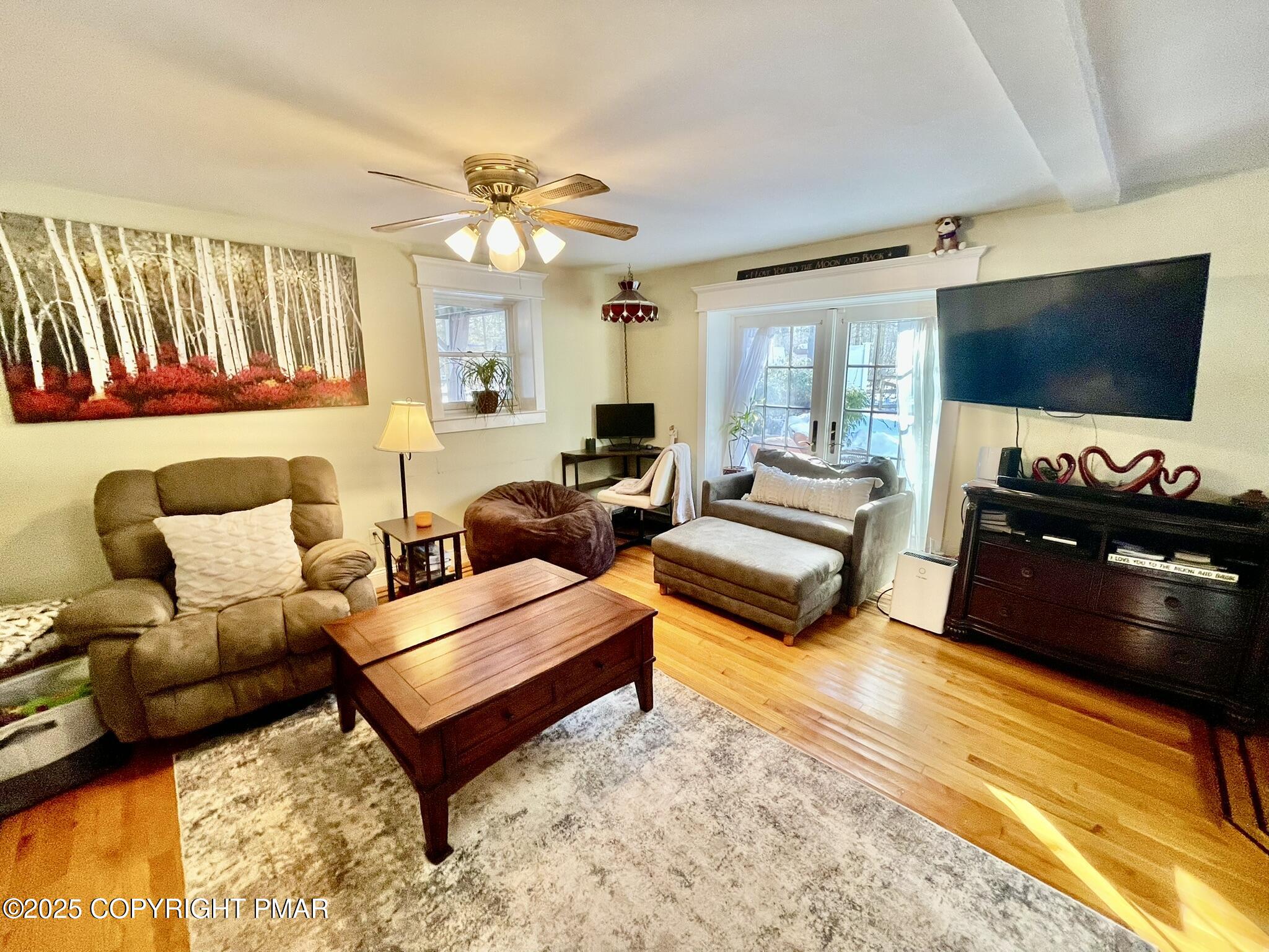 73 Panther Run Road Jim Thorpe, PA 18229 - Photo 15 of 55 a living room with furniture and a flat screen tv