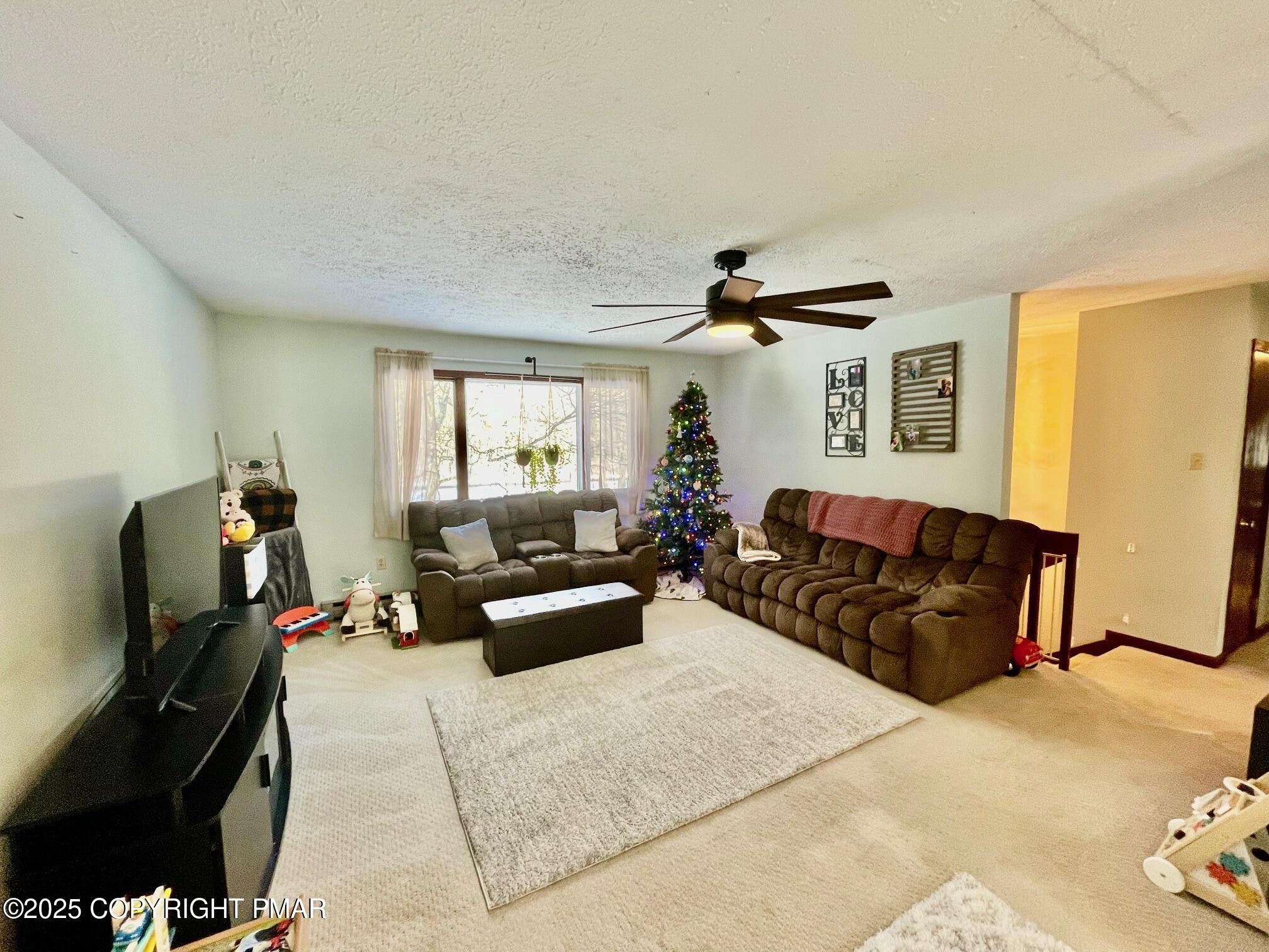 73 Panther Run Road Jim Thorpe, PA 18229 - Photo 21 of 55 a living room with furniture and a flat screen tv