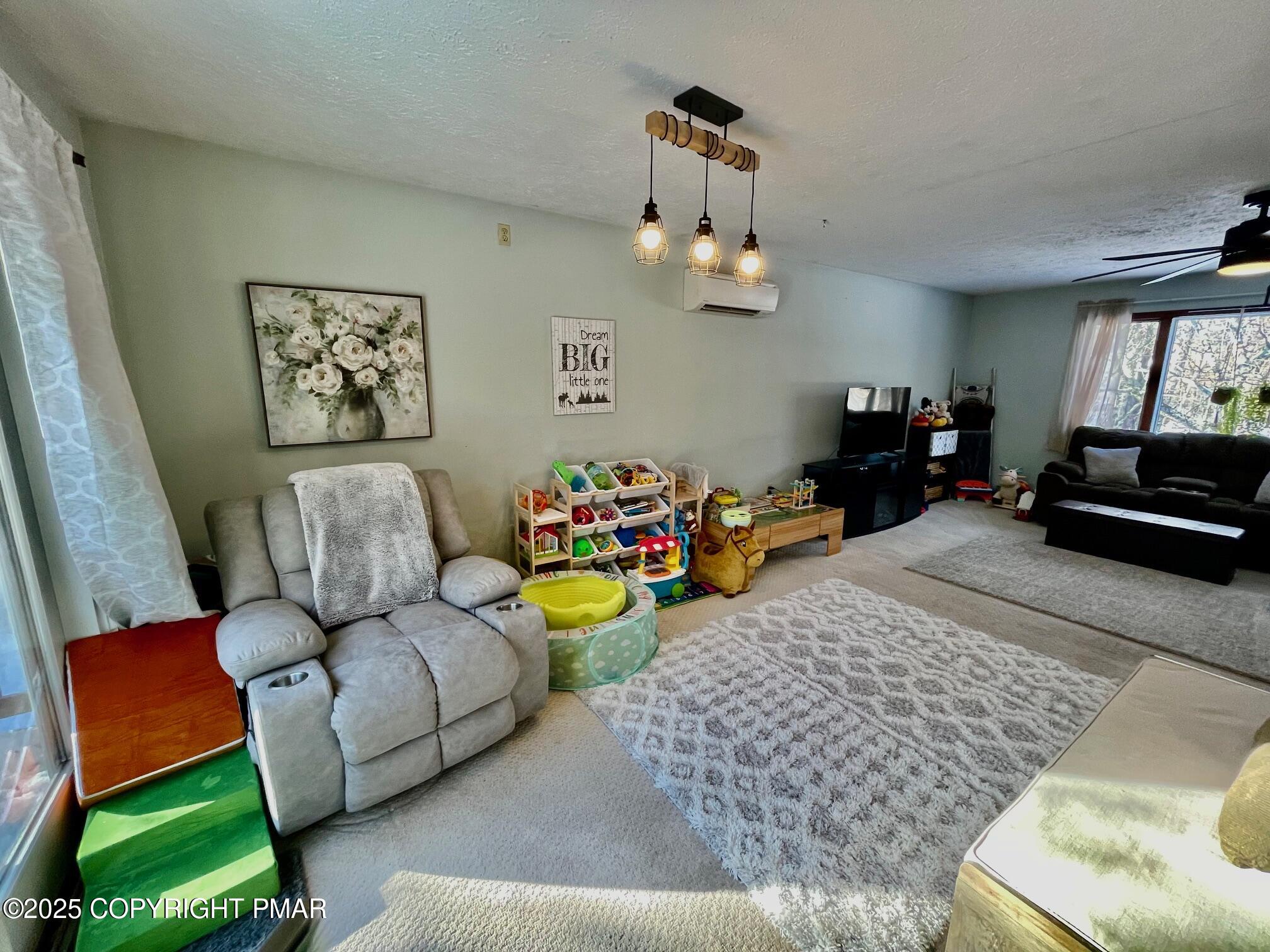 73 Panther Run Road Jim Thorpe, PA 18229 - Photo 25 of 55 a living room with furniture and a window