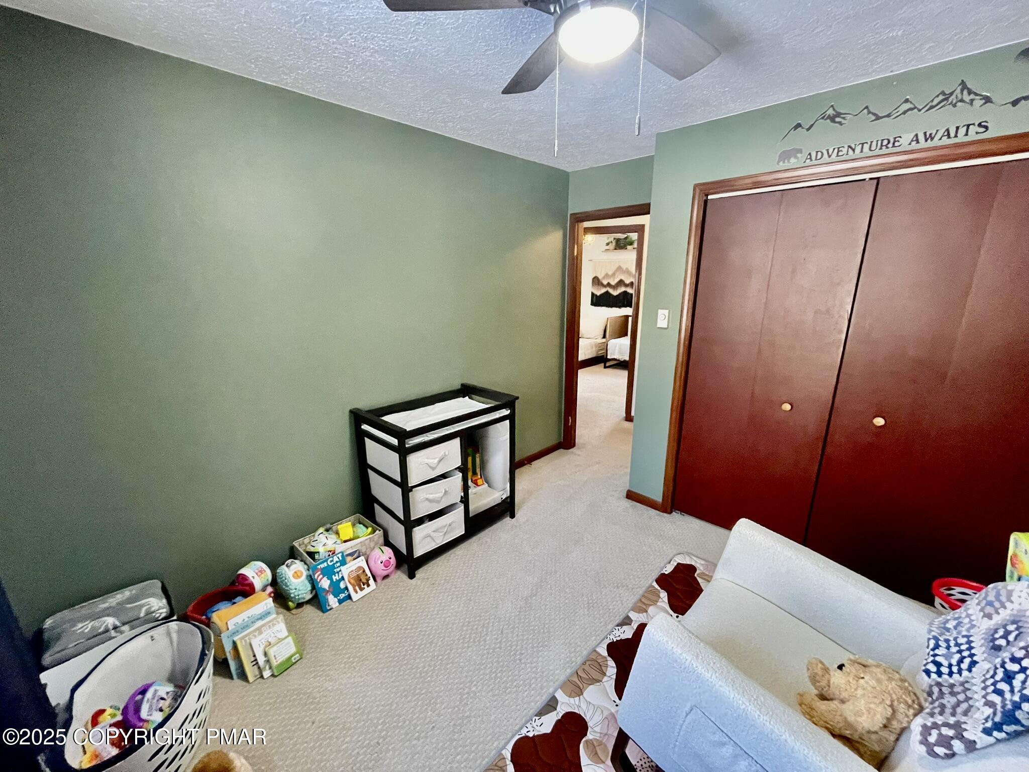 73 Panther Run Road Jim Thorpe, PA 18229 - Photo 33 of 55 a bedroom with furniture and a wooden floor