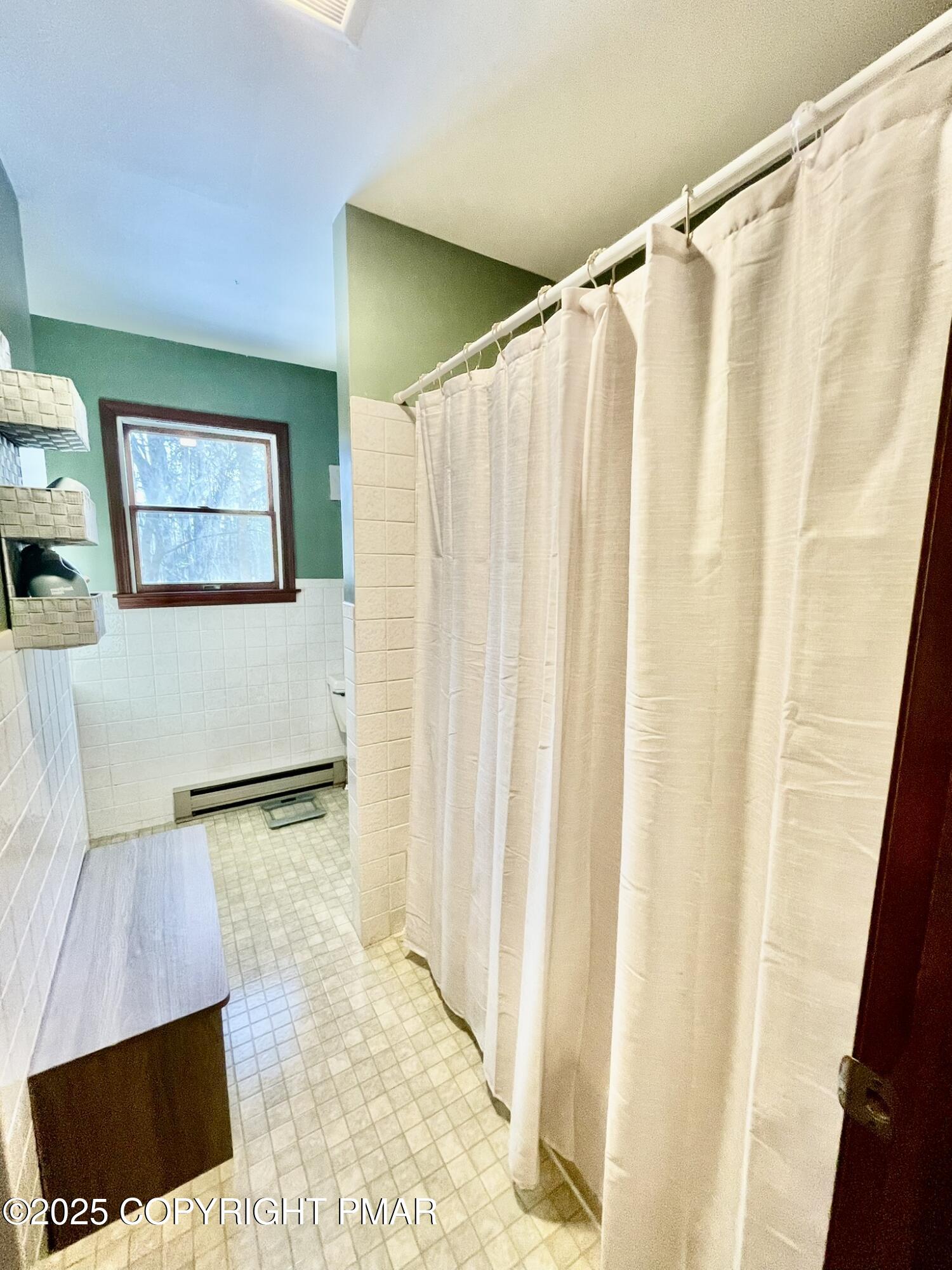 73 Panther Run Road Jim Thorpe, PA 18229 - Photo 38 of 55 a bathroom with a shower curtain and a sink