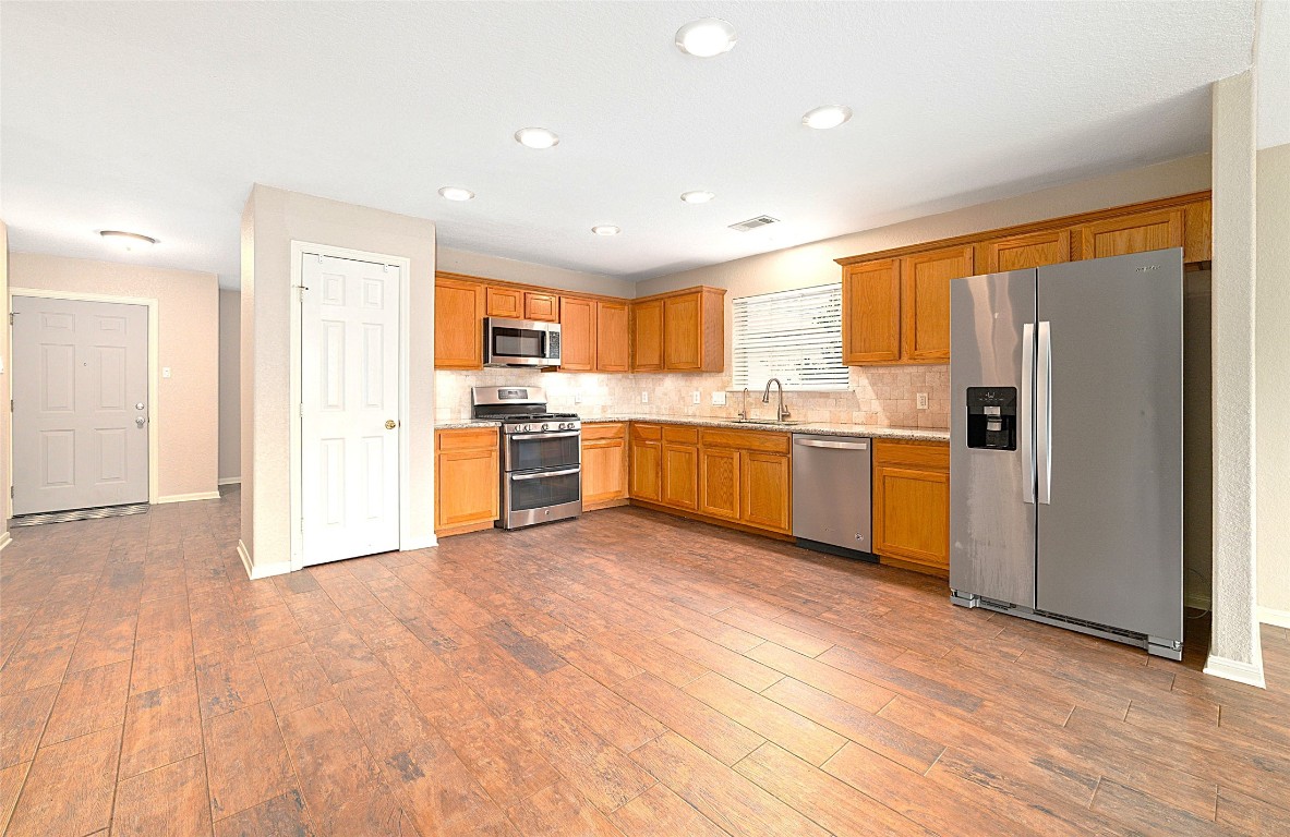 14610 Hazy Ridge Lane Cypress, TX 77429 - Photo 11 of 38 Kitchen has attractive can lights with adjustable lighting